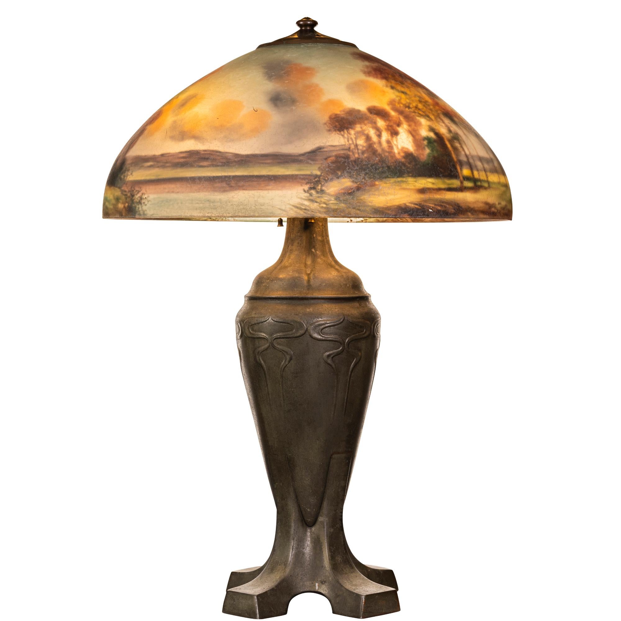 20th Century Handel Patinated Metal Lamp with Reverse Painted Glass Shade For Sale