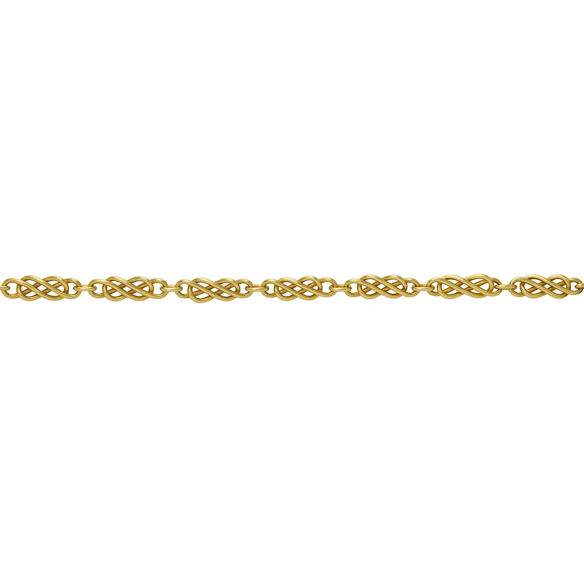 A handmade Celtic gold necklace by Lucie Heskett-Brem the Gold Weaver of Lucerne, consisting of twenty-one sections of Celtic design, hallmarked 18ct gold, measuring approximately 45 x 0.65cm, gross weight 43.6 grams.
Should you choose to make this