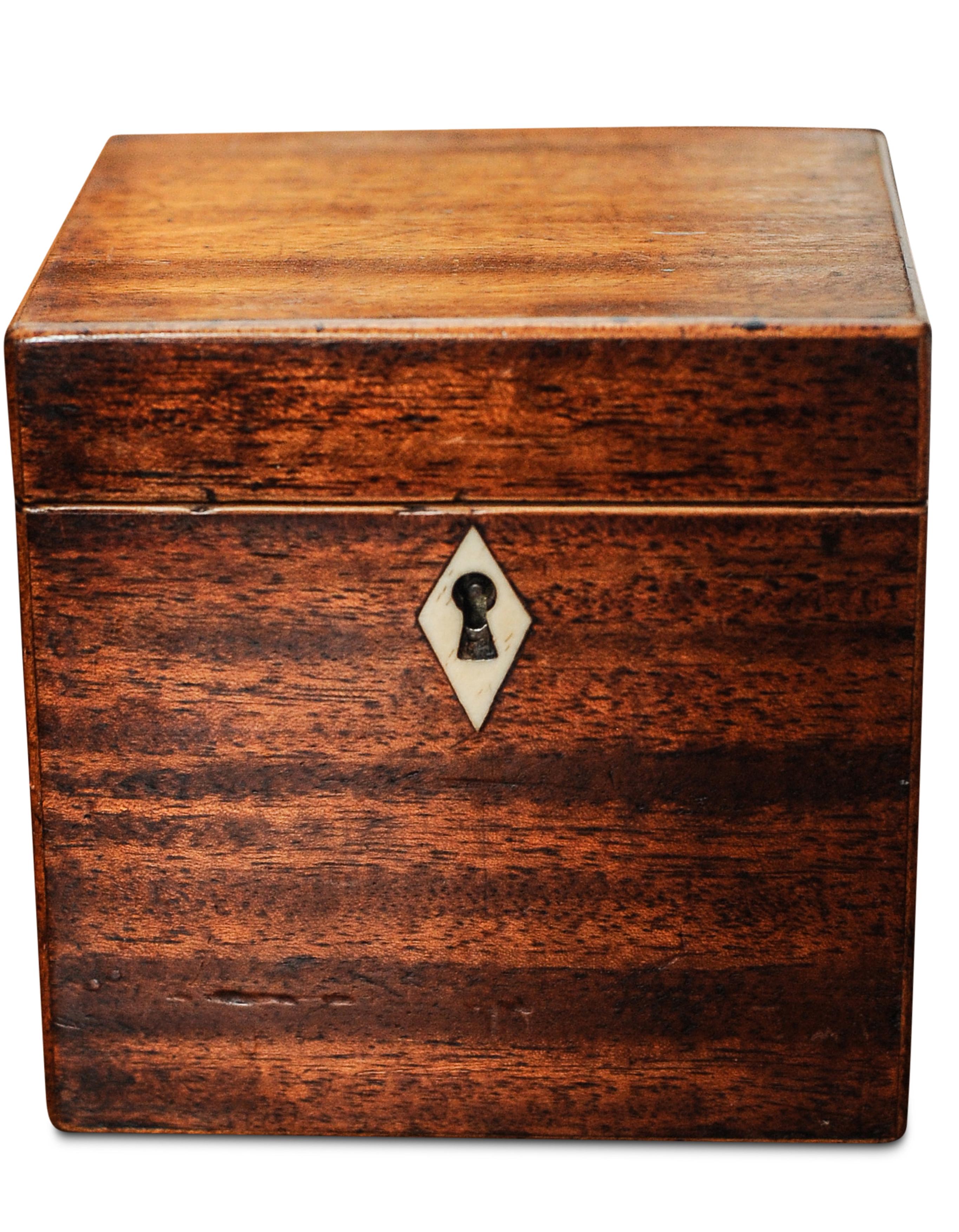 A Handmade Victorian Fruitwood & Inlay Tea Caddy With Zinc Lining

A tea caddy is a box, jar, canister, or other receptacle used to store tea. When first introduced to Europe from Asia, tea was extremely expensive, and kept under lock and key. The