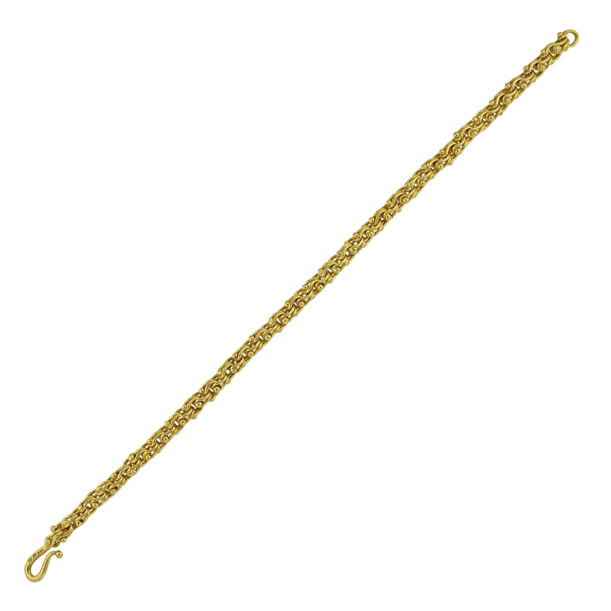 A handmade Water Ballet bracelet by Lucie Heskett-Brem the Gold Weaver of Lucerne, hallmarked 18ct gold, measuring approximately 19 x 0.5 cm, gross weight 20.1 grams. 

Should you choose to make this purchase we would be delighted to send it to you