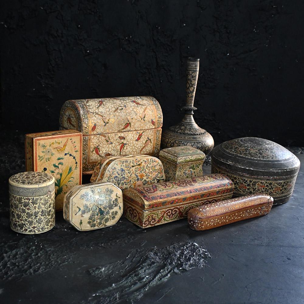 A handpicked Collection of late 19th century Papier Mache Kashmiri objects 

We share what we love, and we love this handpicked collection of late 19th to early 20th century papier Mache Kashmiri assorted decorative objects. These items are hand