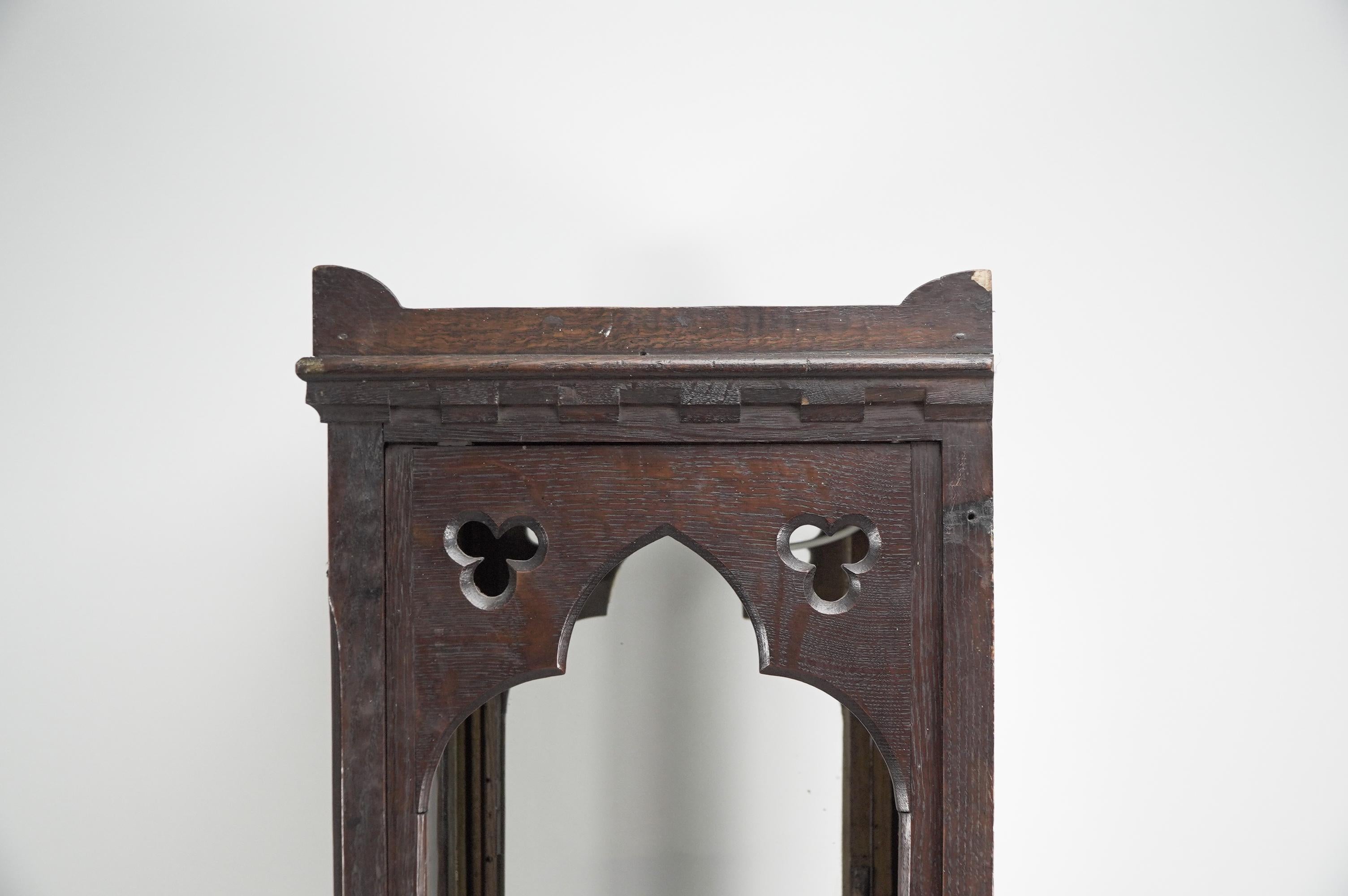 Gothic Revival oak display cabinet with arch & quatrefoil decoration on a stand. For Sale 6