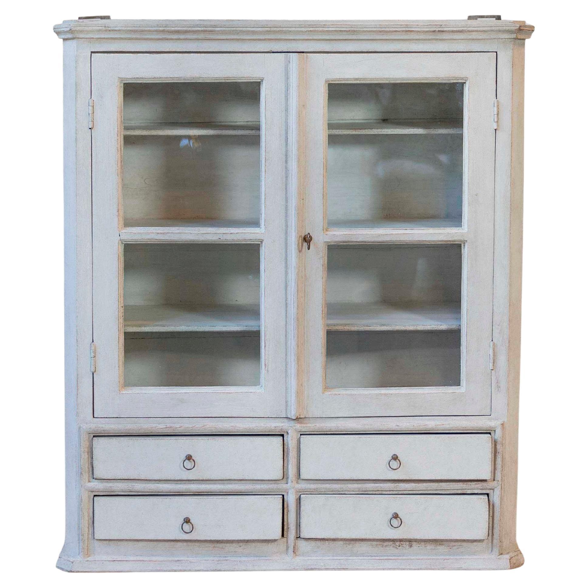 A hanging cabinet from Sweden with glass doors in grey For Sale