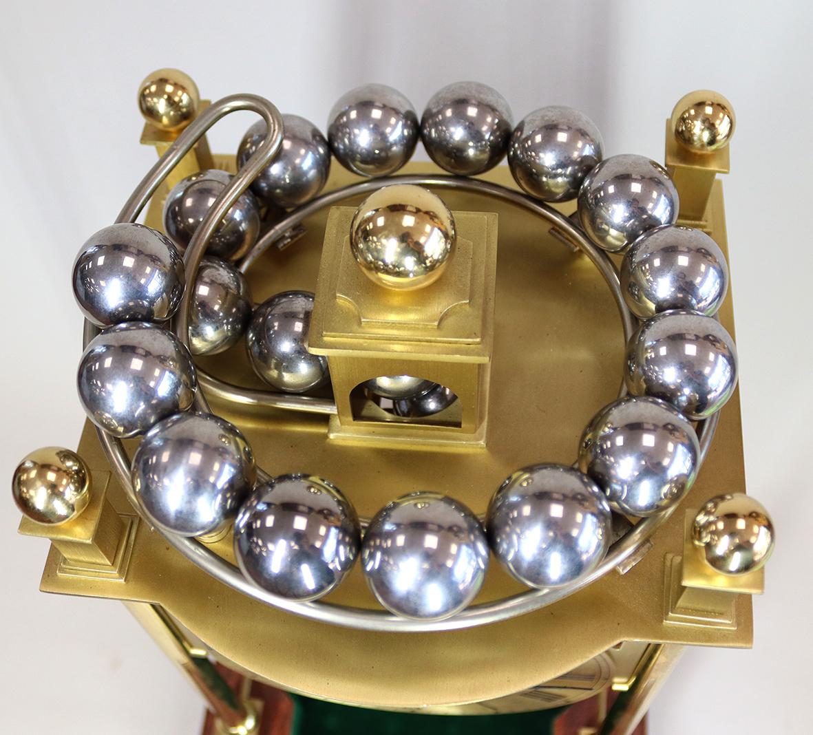 Late 20th Century A Harding and Bazeley Limited Edition Spherical Weight Clock For Sale