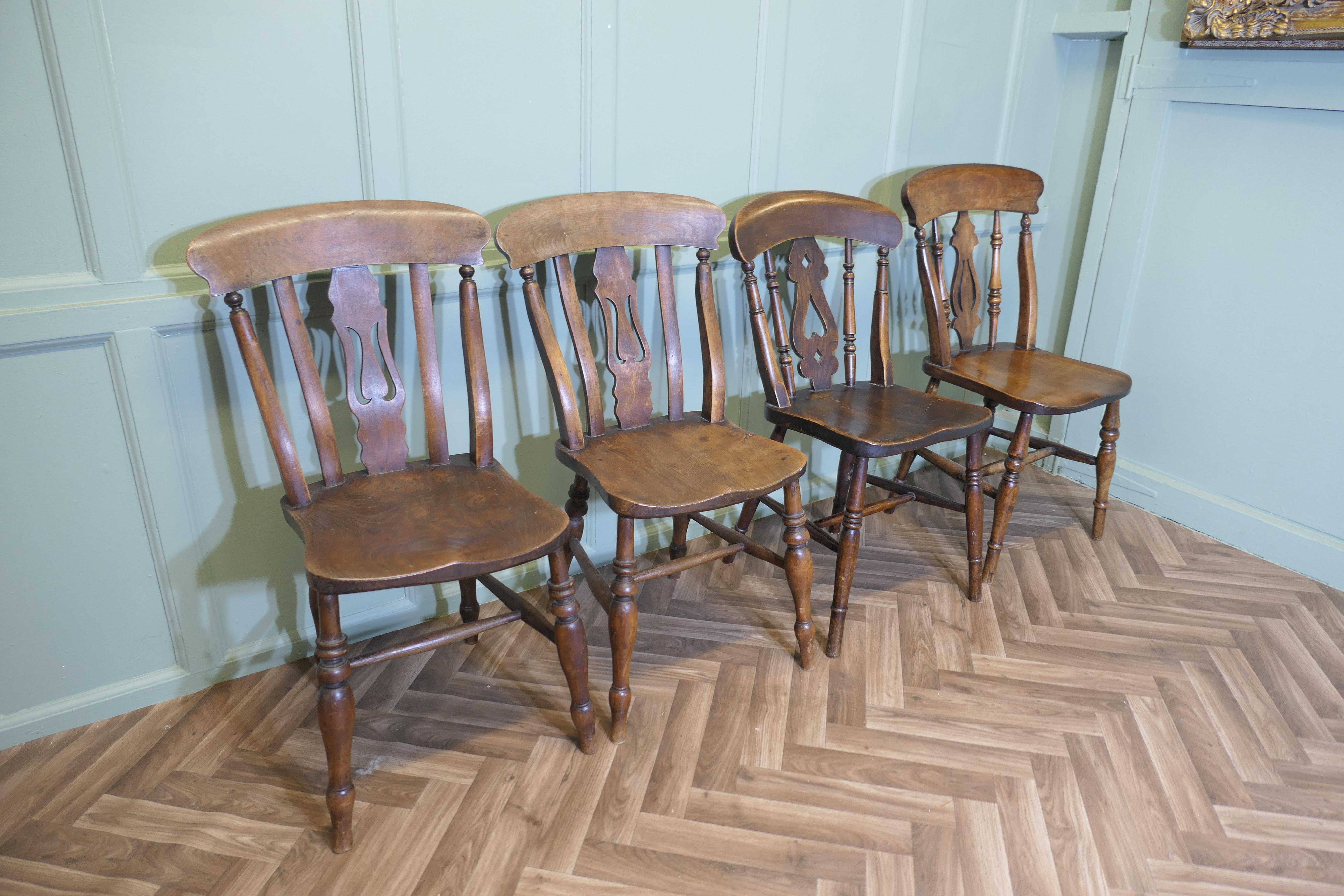 Arts and Crafts A Harlequin Set of 4 Beech & Elm Fiddle Back Chairs For Sale