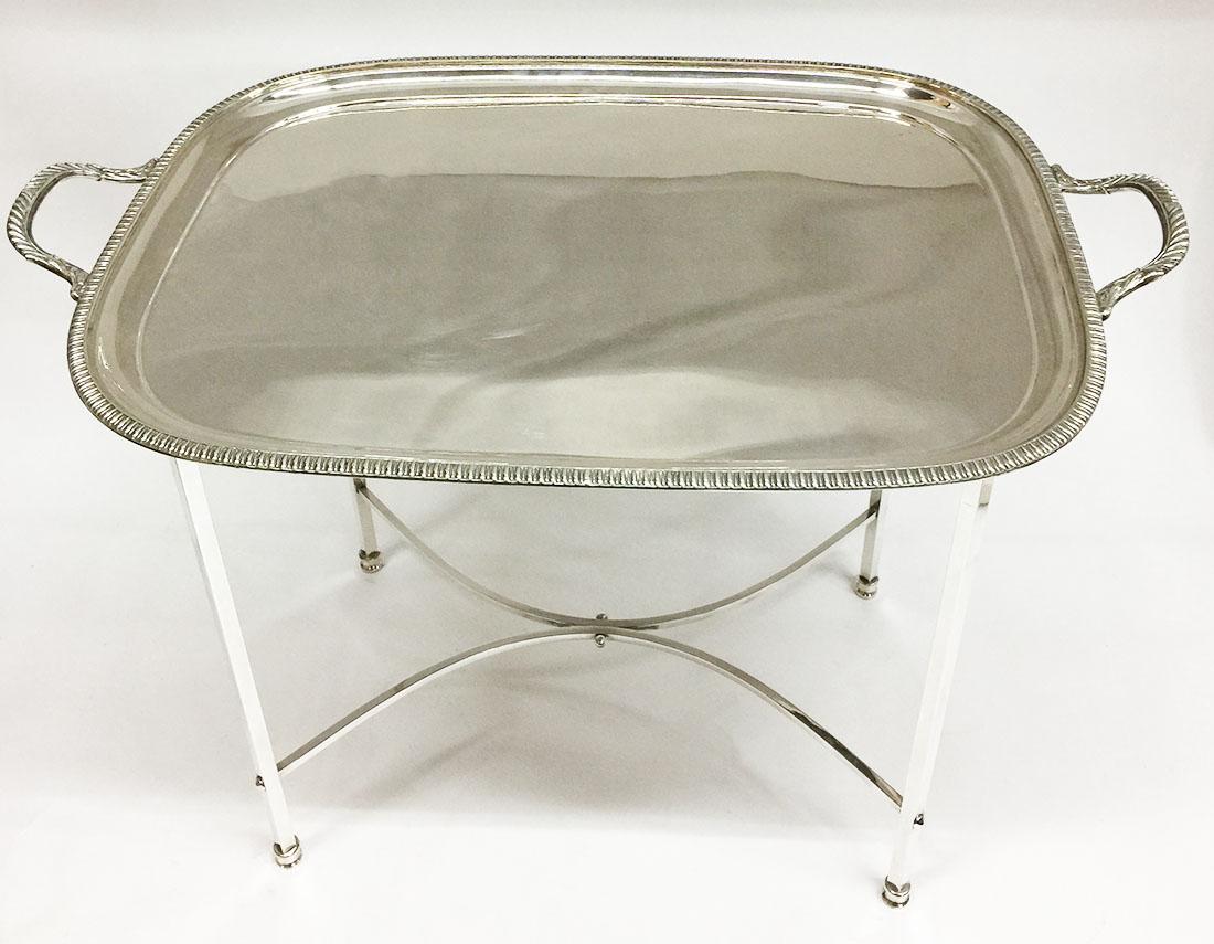 A Harrison Brothers & Howson English silver plated tea table

A Harrison Brothers & Howson English silver plated tea table with tray and Stand
The mark HB&H inside a shield of A Harrison Brothers & Howson (1862-1909) in Birmingham
The tray with