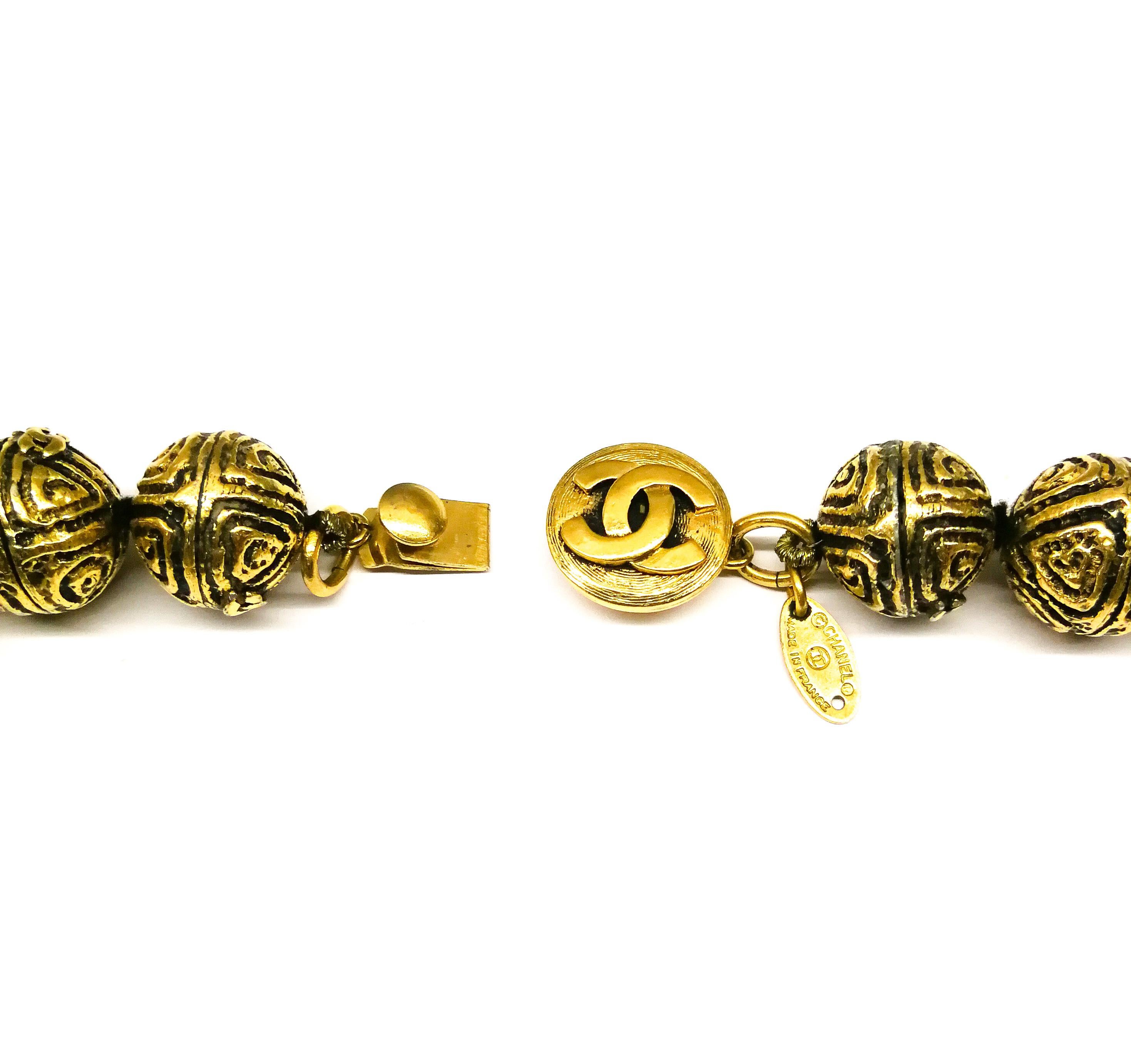A heavily engraved gilt ball and circle logo necklace, Chanel, France, 1980s 6