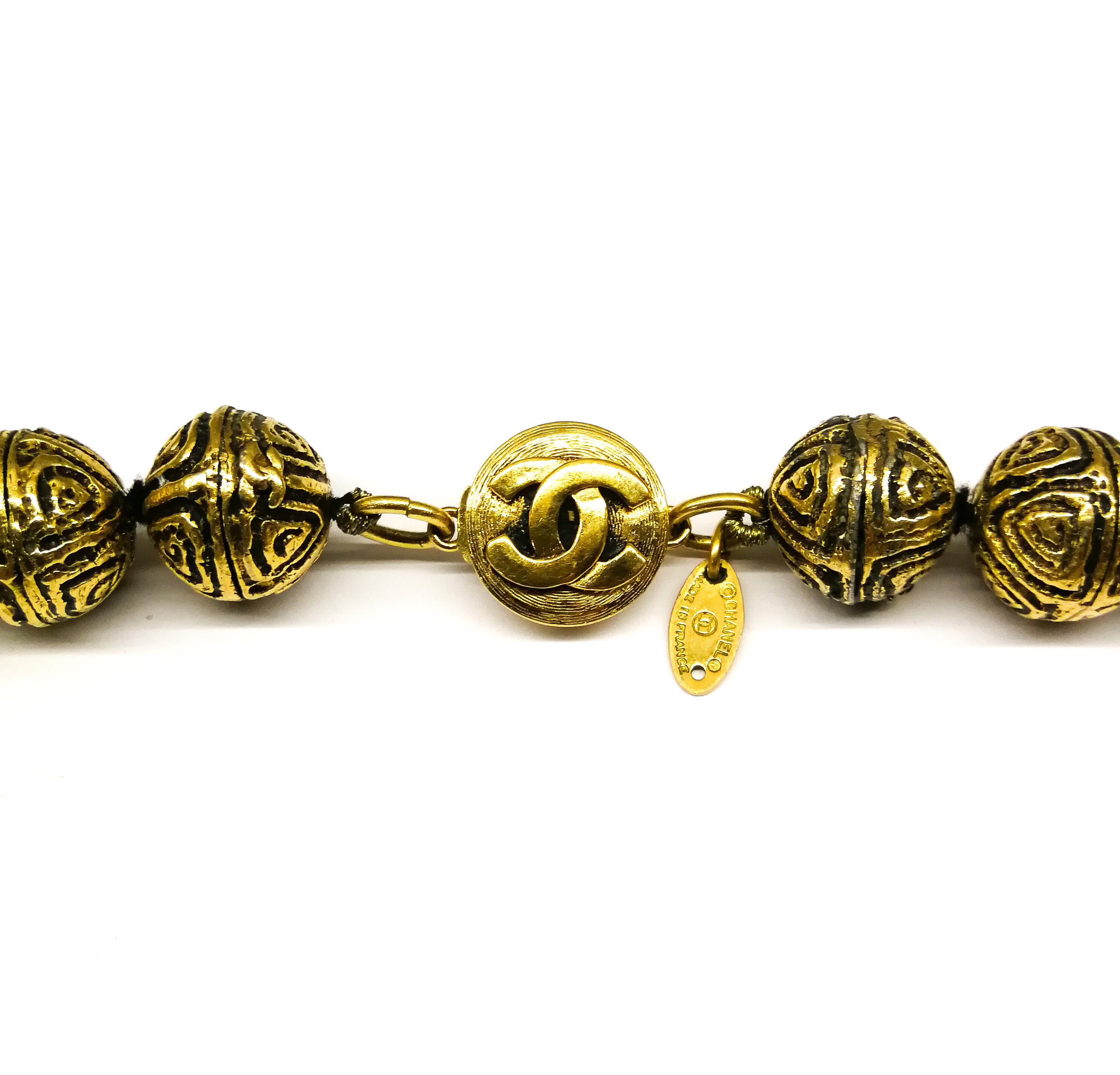 A heavily engraved gilt ball and circle logo necklace, Chanel, France, 1980s 7