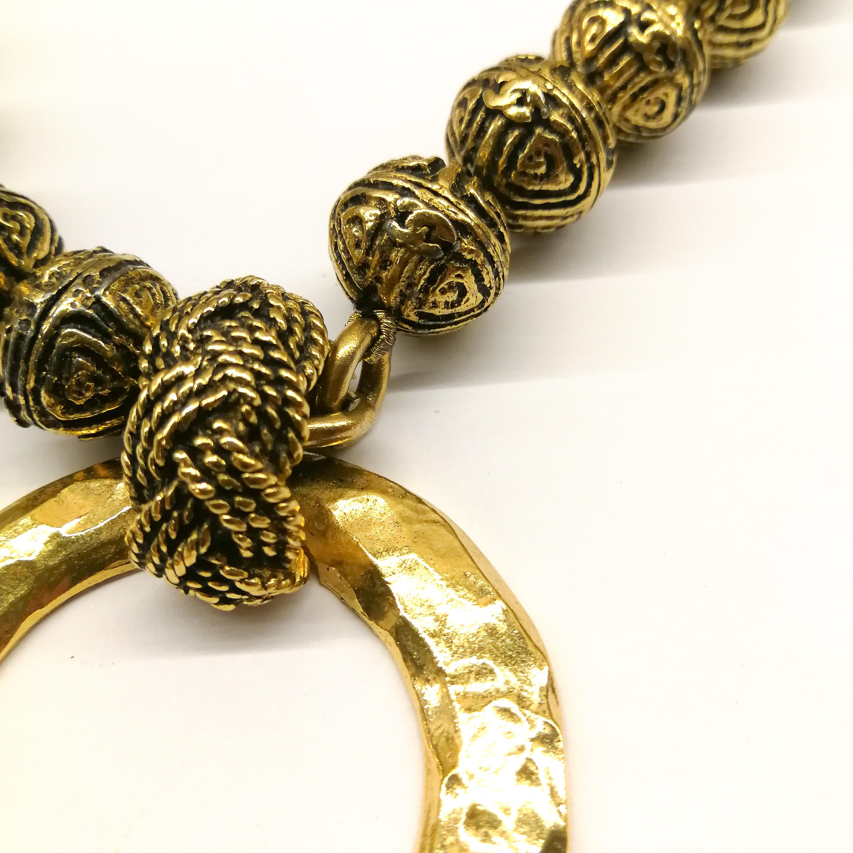 A heavily engraved gilt ball and circle logo necklace, Chanel, France, 1980s In Excellent Condition In Greyabbey, County Down