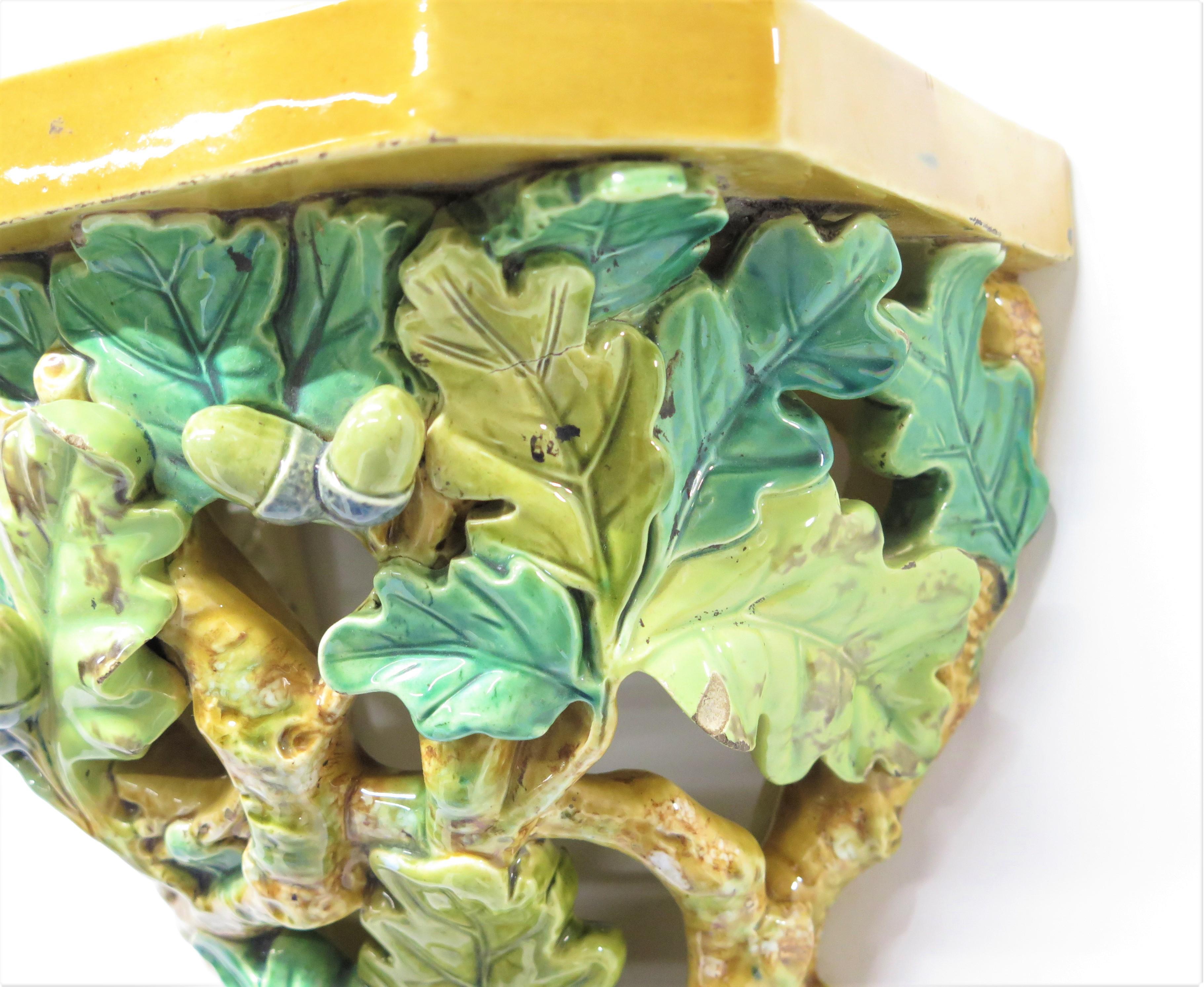 a heavy Brownfield majolica wall bracket in a reticulated oak leaves and acorn design, circa 1885 - 1892

MEASUREMENTS;

9.5