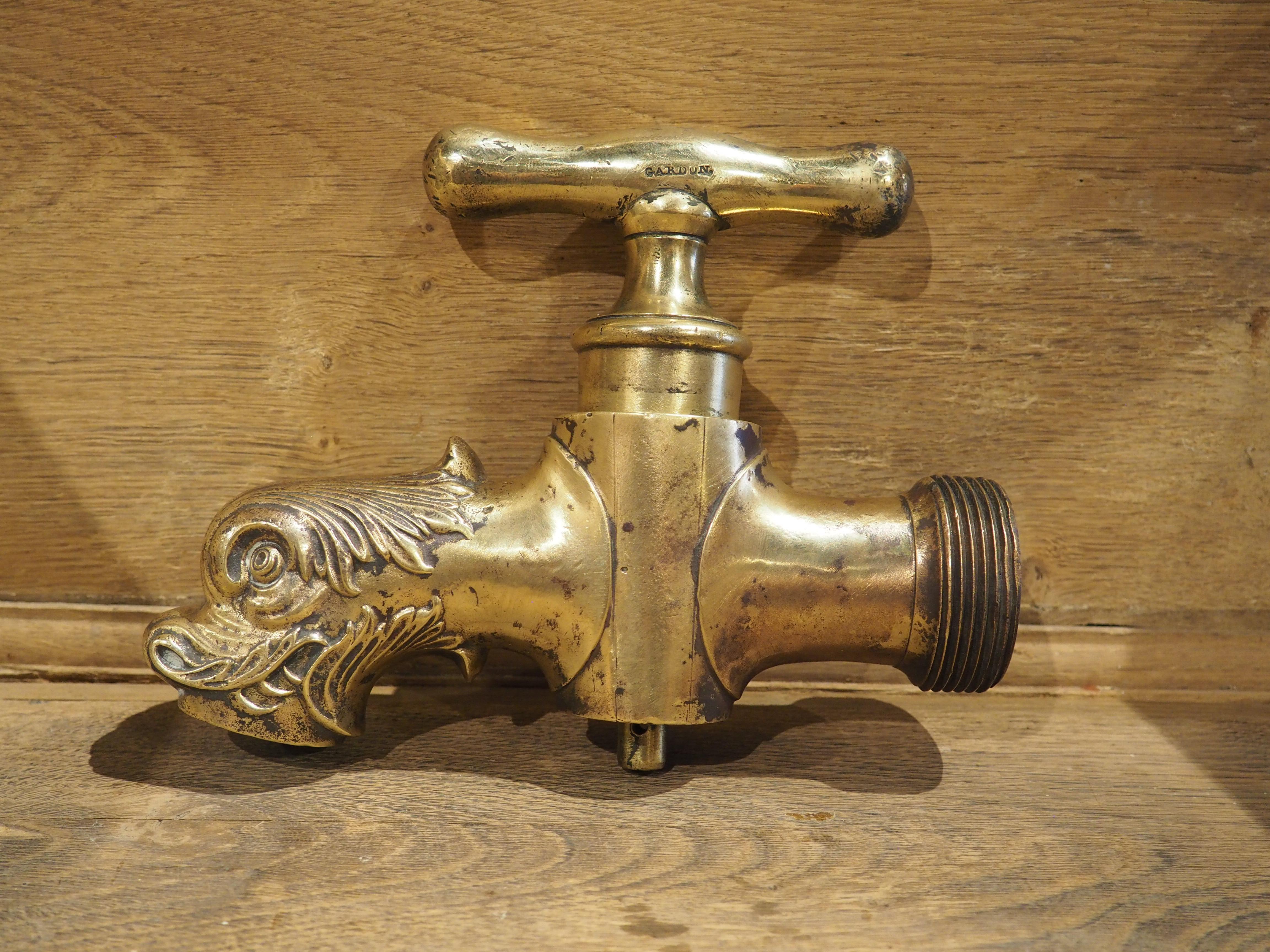 More information coming soon…

Dating to circa 1850, this French gilt bronze fountain spout is in the form of a dolphin.  Equipped with an undulating T-handle that controls the flow of water through the 1 3/8″ inch opening that is formed by the