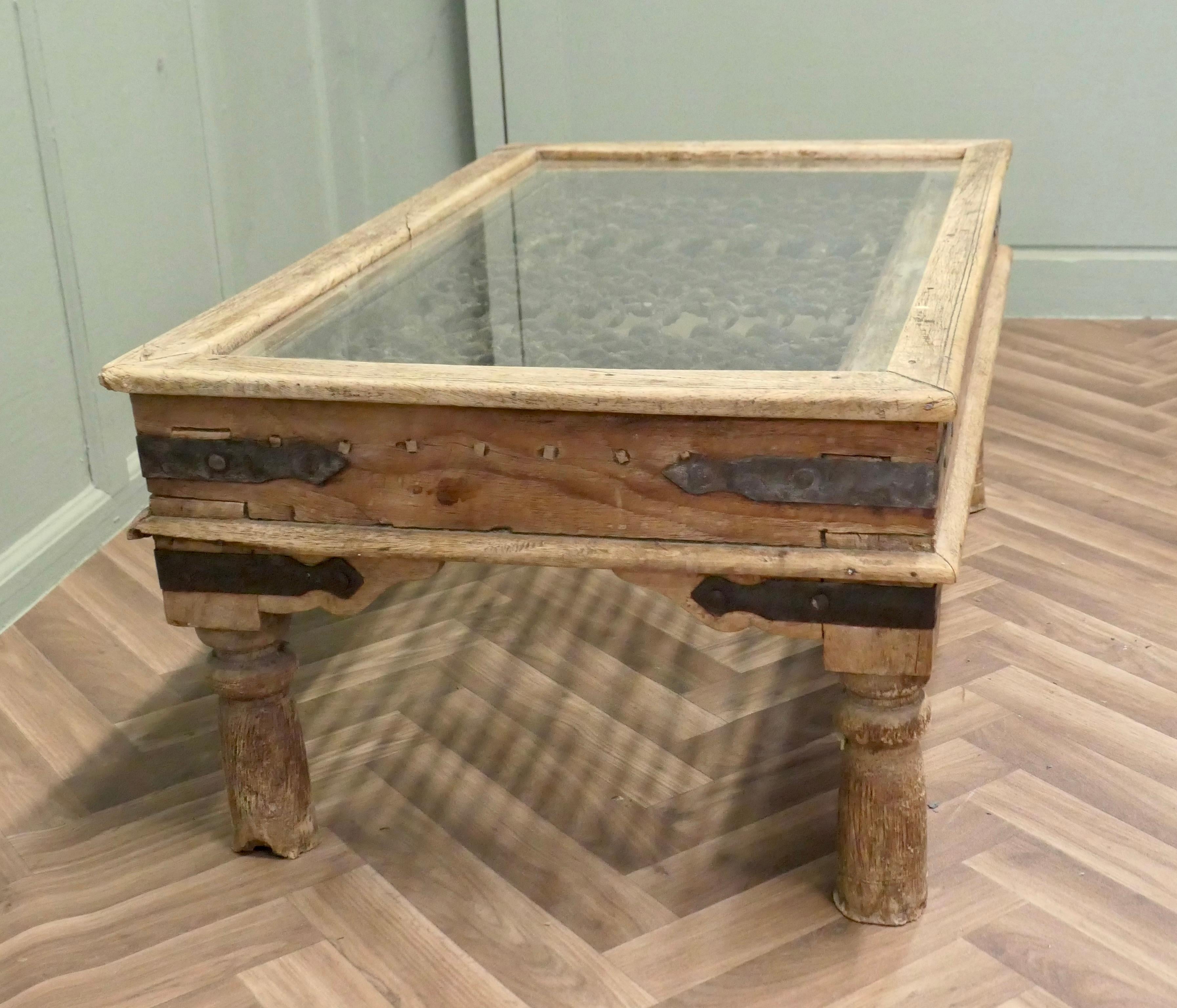 Early 20th Century A Heavy Coffee Table with Inset Iron Grill Panel For Sale
