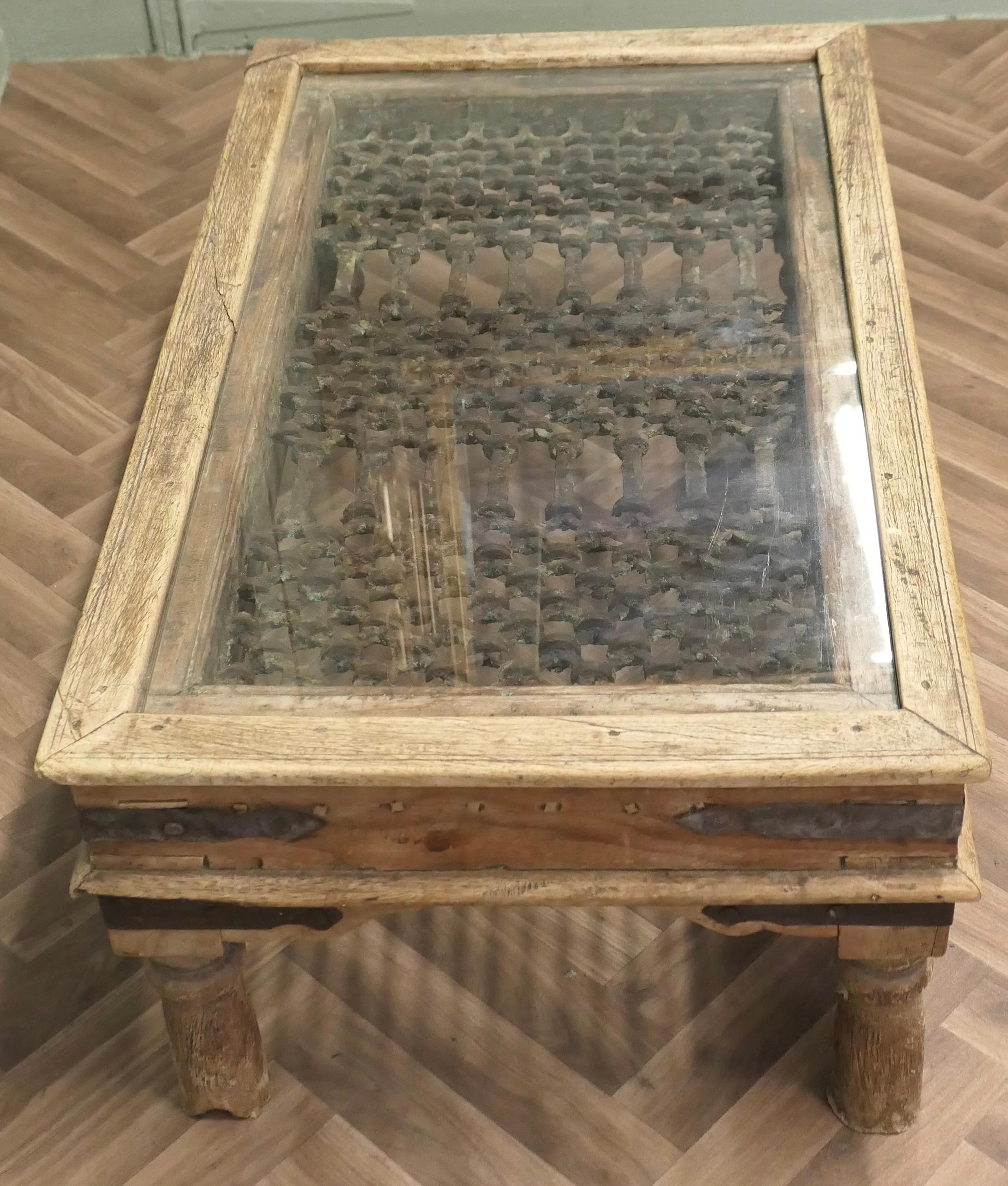 A Heavy Coffee Table with Inset Iron Grill Panel For Sale 1