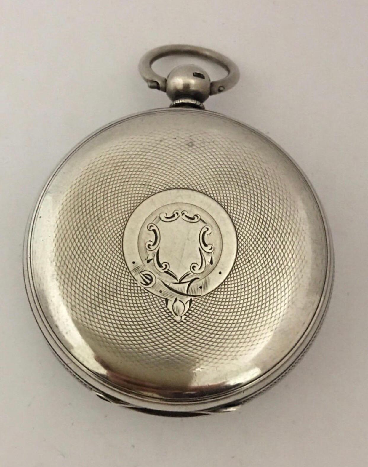 This beautiful 58mm watch diameter antique silver key-wind pocket watch is in good working condition. It has recently been serviced and it is running well.  Visible signs of aged and gentle used as shown. Unsigned movement number 2827 which is the