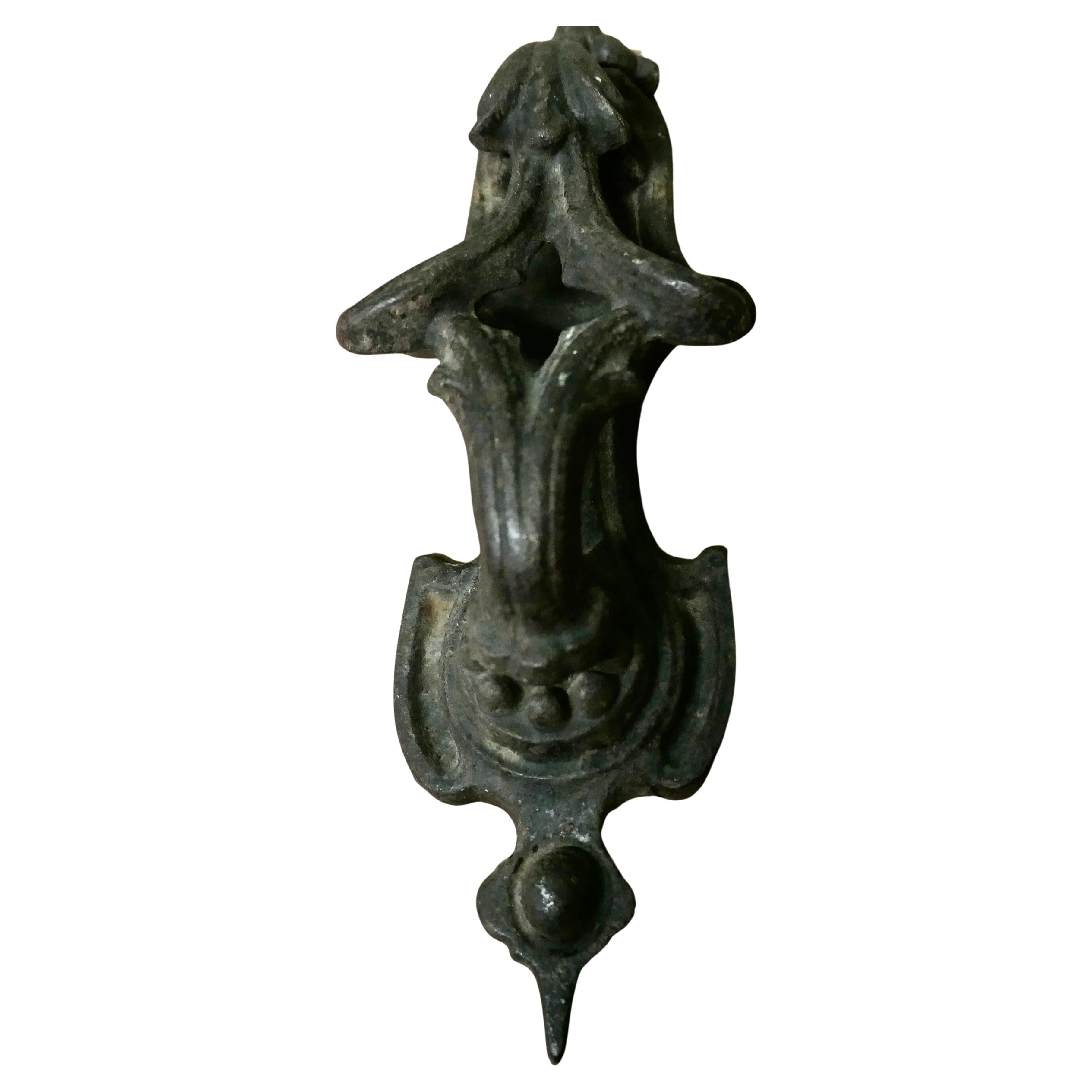 A Heavy Victorian Iron Door Knocker This is a classic Victorian door knocker
