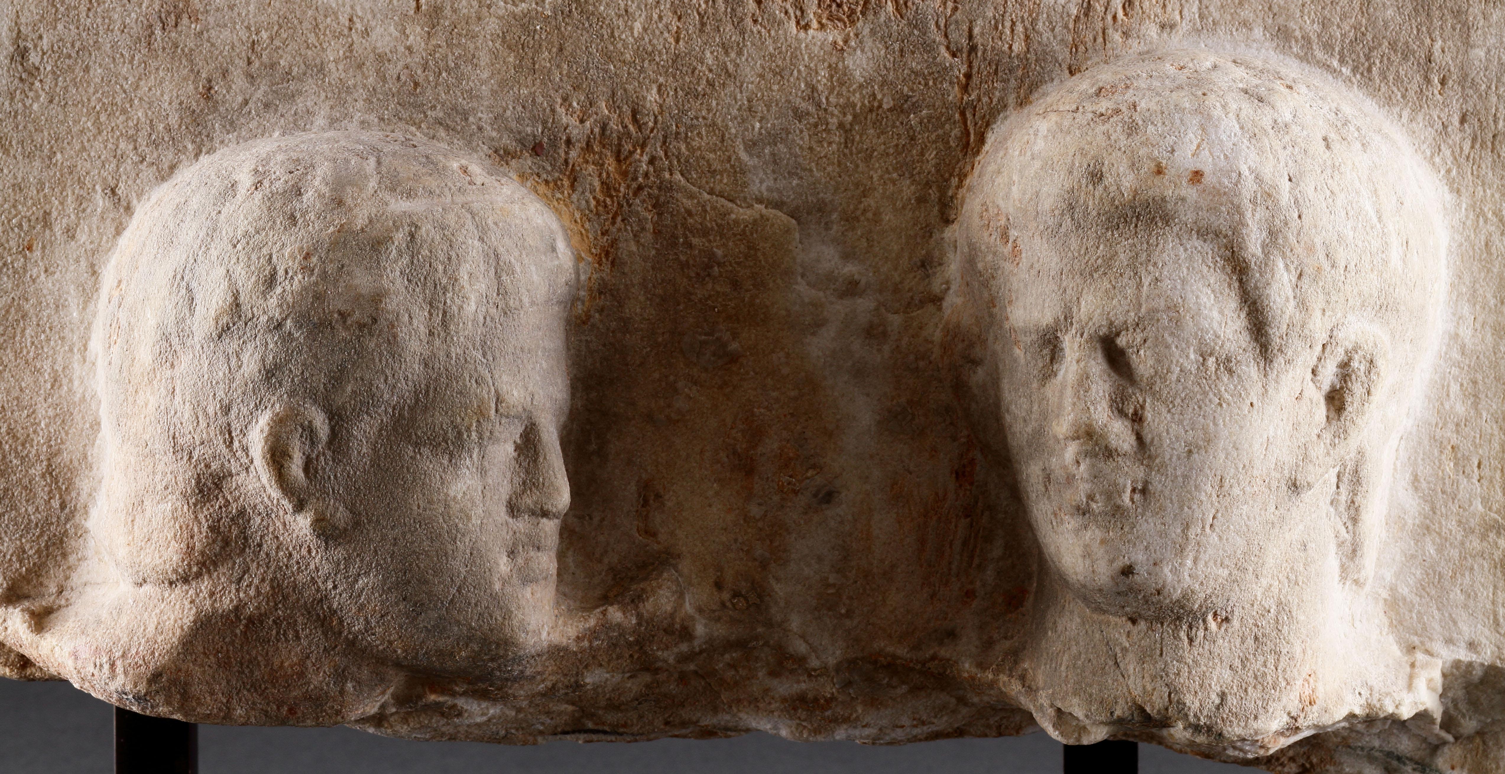 A Hellenistic Funerary Stele in High Relief with Two Male Heads In Fair Condition For Sale In London, GB
