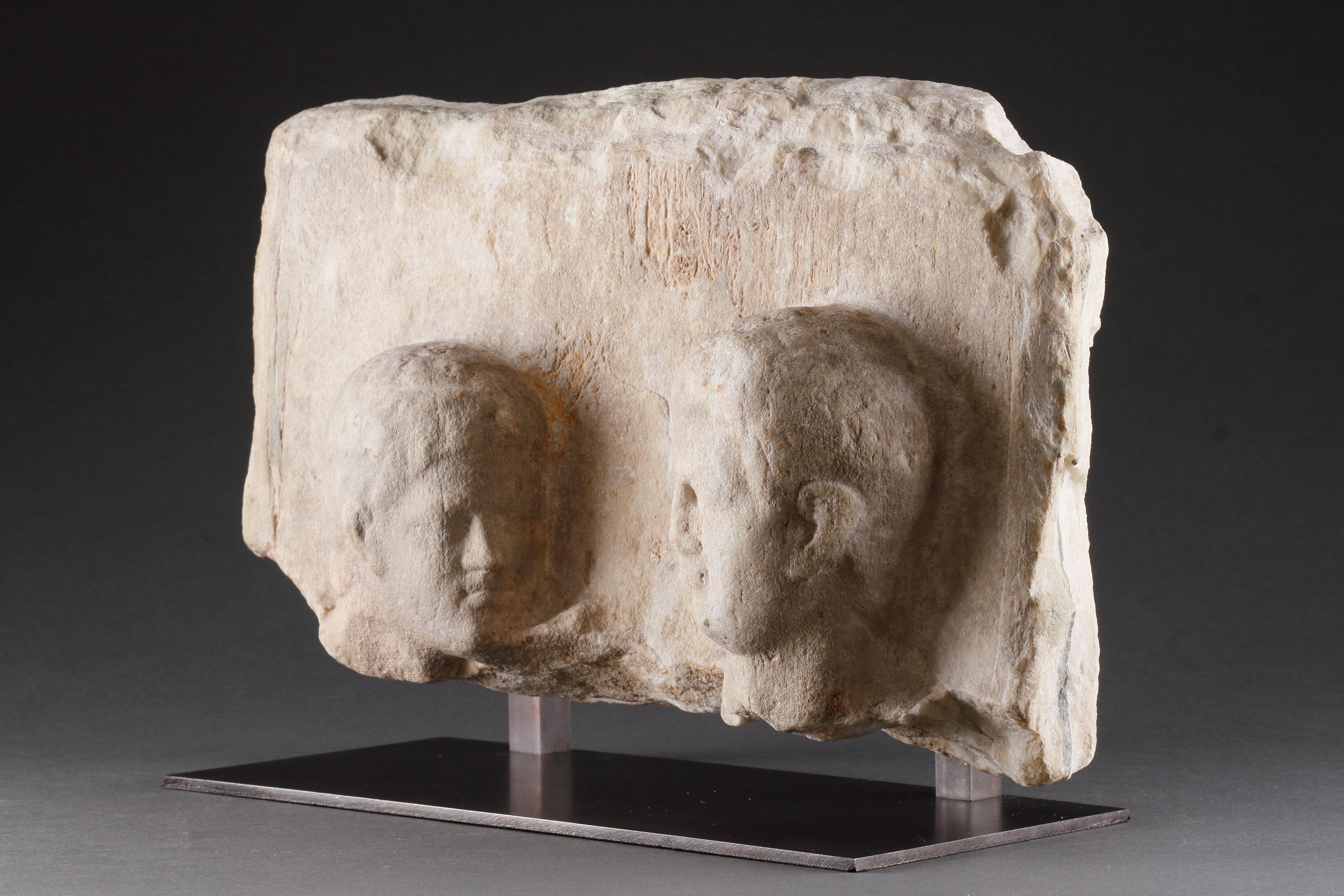 18th Century and Earlier A Hellenistic Funerary Stele in High Relief with Two Male Heads For Sale