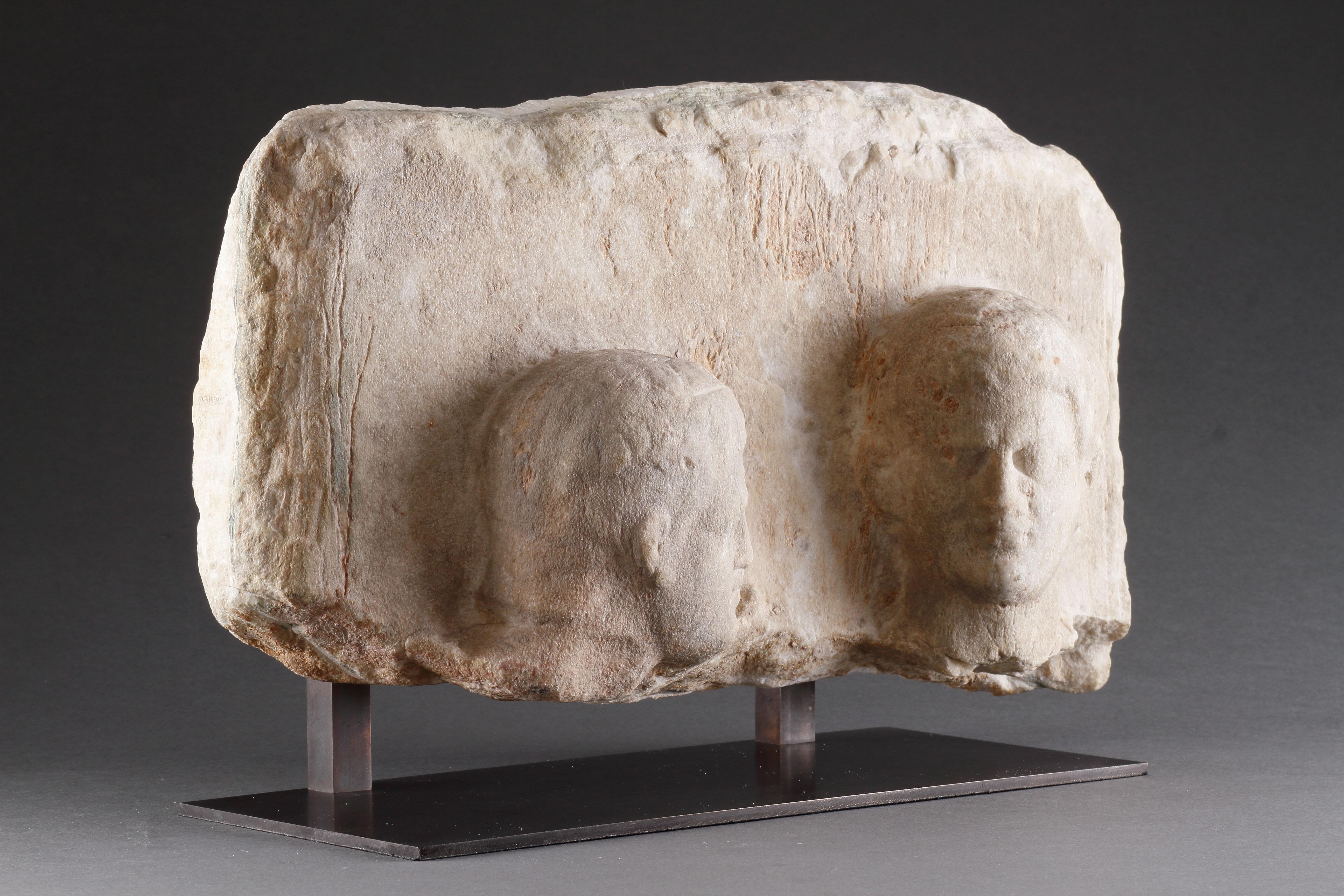 Marble A Hellenistic Funerary Stele in High Relief with Two Male Heads For Sale