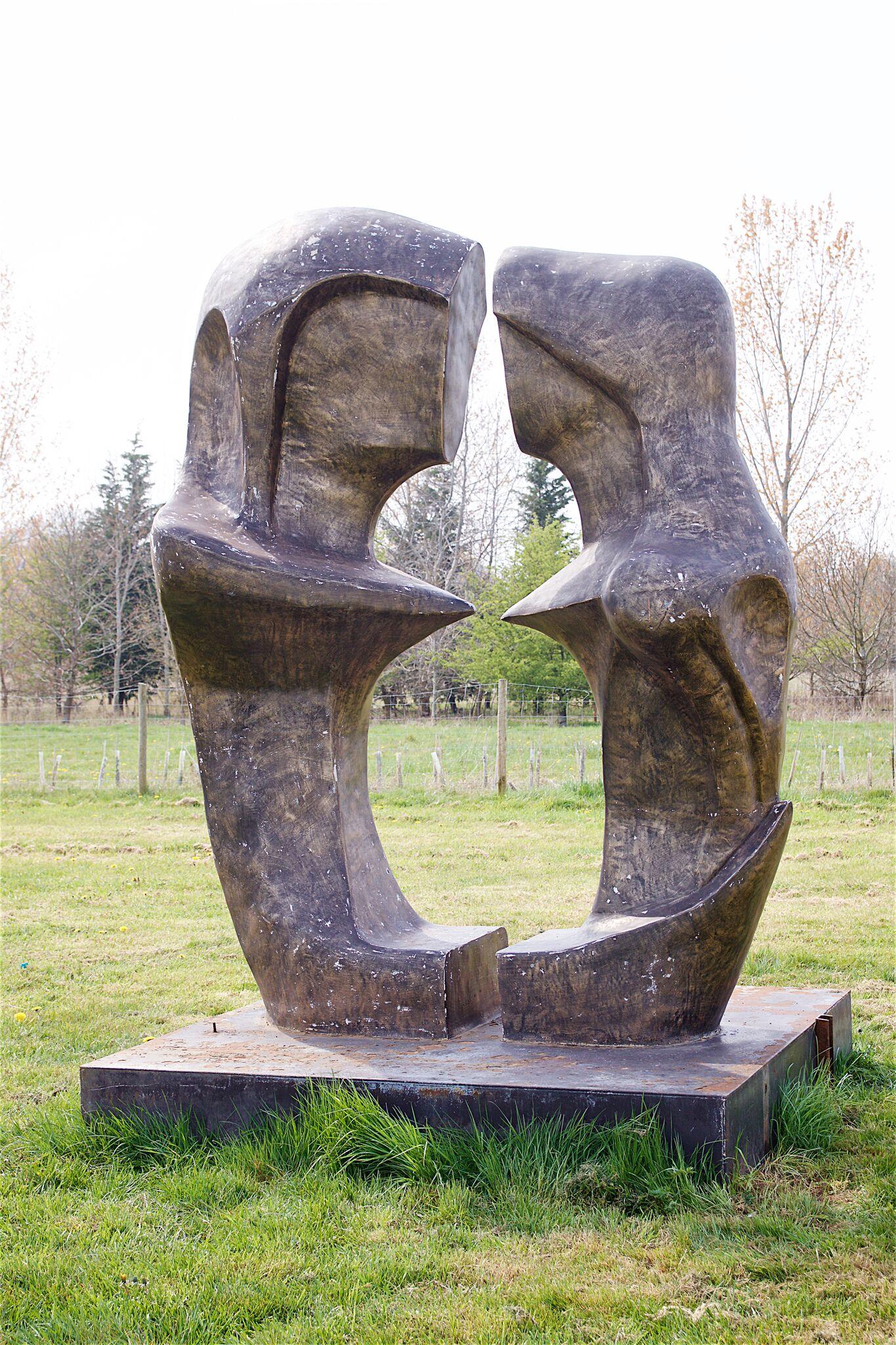 A Henry Moore style garden sculpture in the style of a mid-20 century work. Fibre glass, circa 1980.