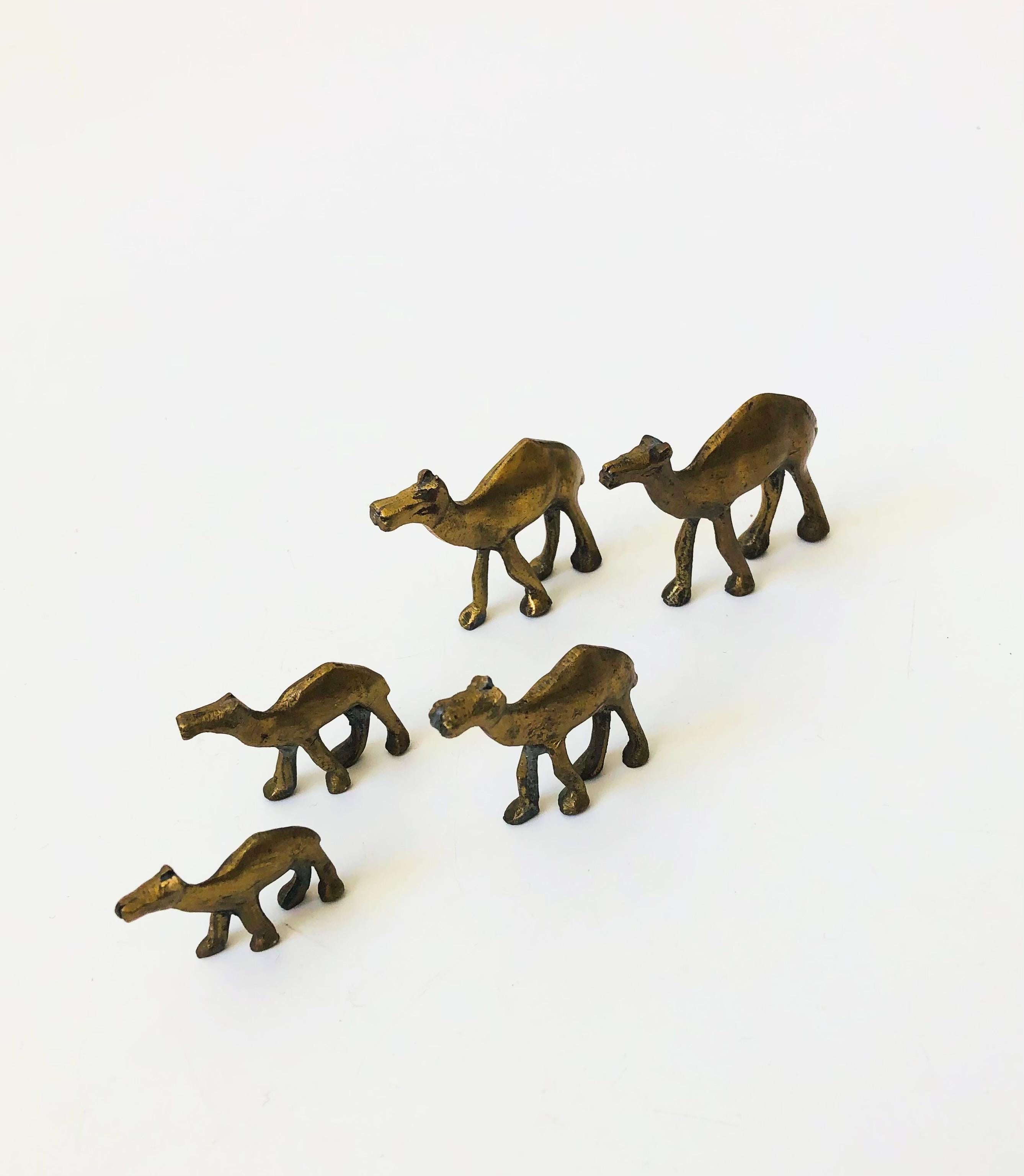 A wonderful set of 5 vintage brass camels in varying sizes. Perfect for creating a little camel herd on your bookshelf.
Each camel varies in size, the smallest is 1.5