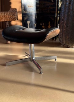 A Herman Miller Eames style footstool, mid 20th century