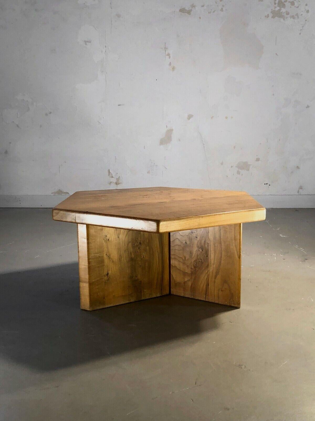 A small but powerful hexagonal coffee table on a tripod base; might be used also as a side table, bedside table or a headboard; Modernist, Brutalist, Folk Art, Forme-Libre, structure and tray in massive elm by Maison Regain, France, 1950-1960.