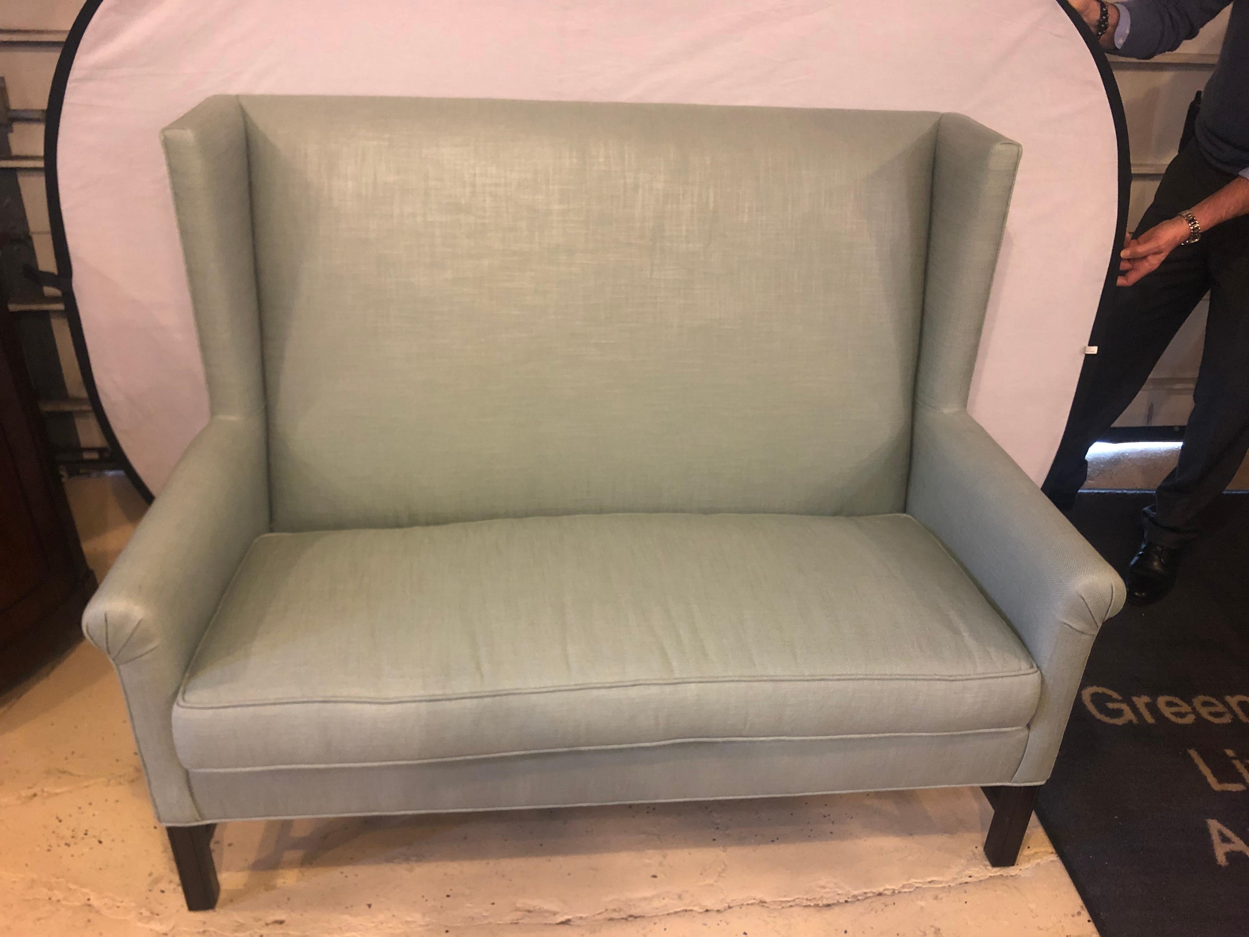 Hickory Co Charles Stewar Chippendale Style Settee or Loveseat in Green Linen
A Hickory Furniture Company by Charles Stewart Tweed Linen Chippendale style wing backed settee - loveseat or sofa. This finely covered loveseat or sofa is simply