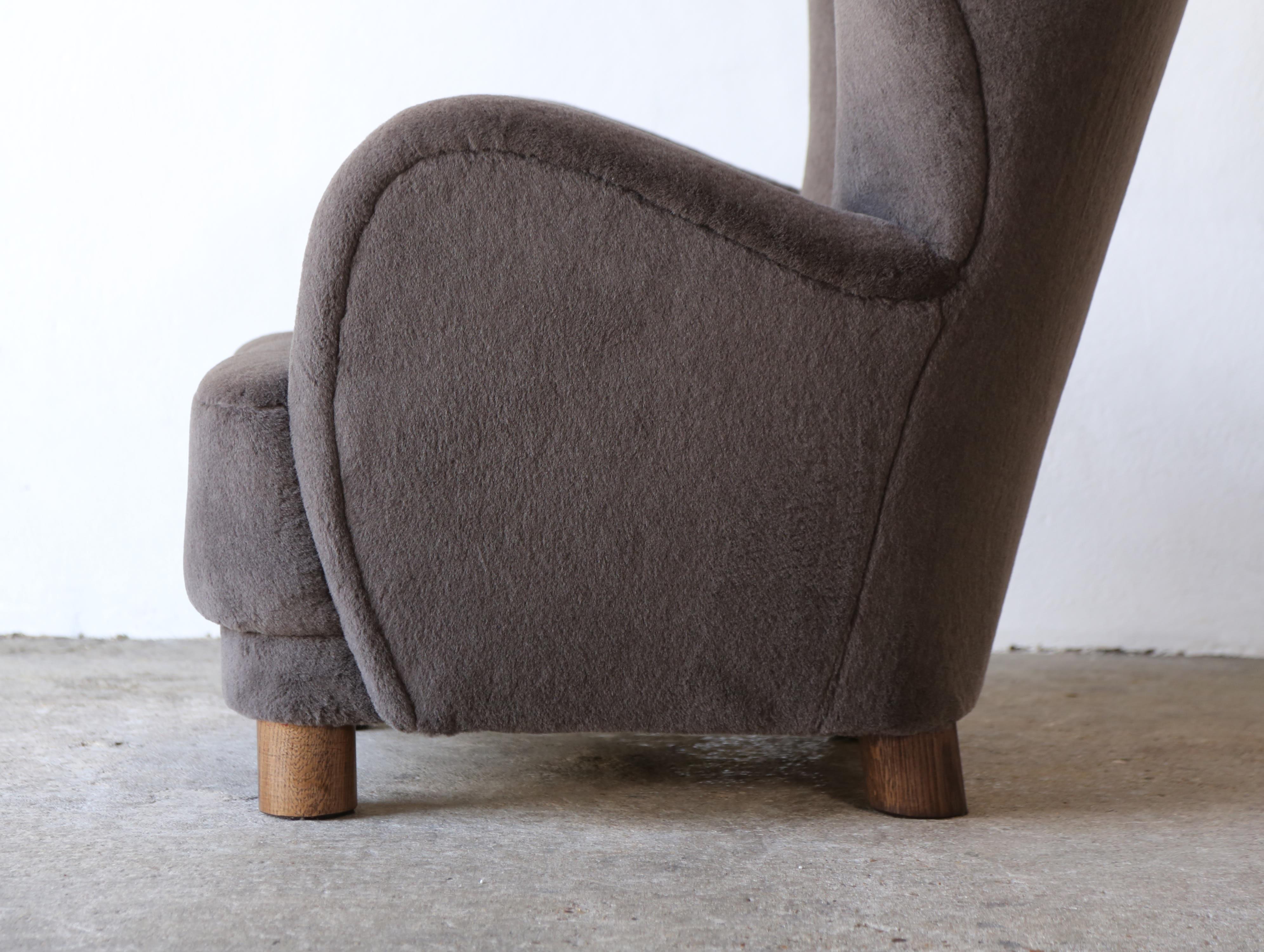 Scandinavian Modern A High Back Arm Chair, Upholstered in Pure Alpaca Wool For Sale