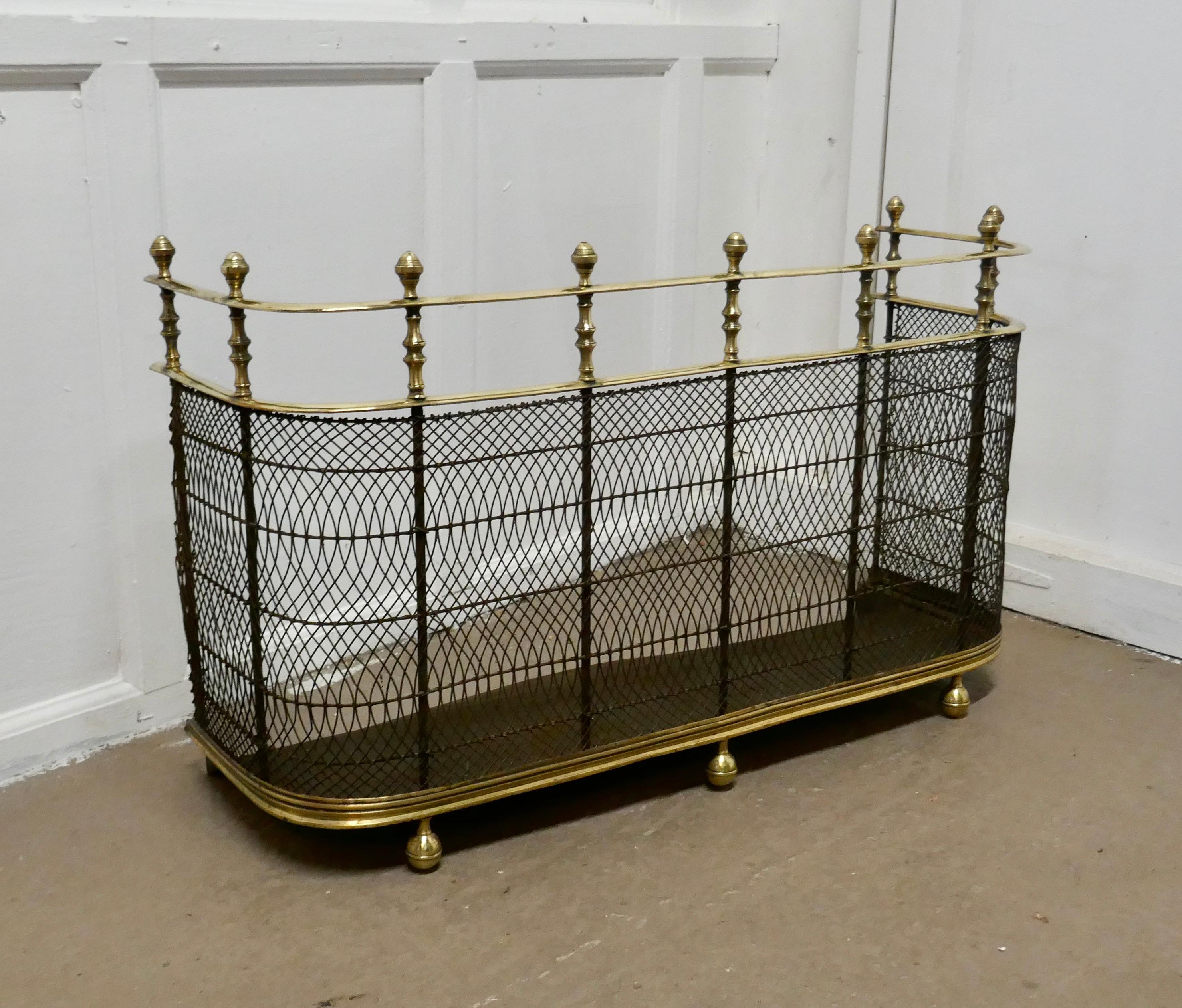 A high Georgian brass nursery fire guard fender 

This is a Georgian antique Fender often known as a nursery guard as it completely surrounds the fire. 
This Fender is top quality and heavy, it is made in brass, it has a double rail separated by
