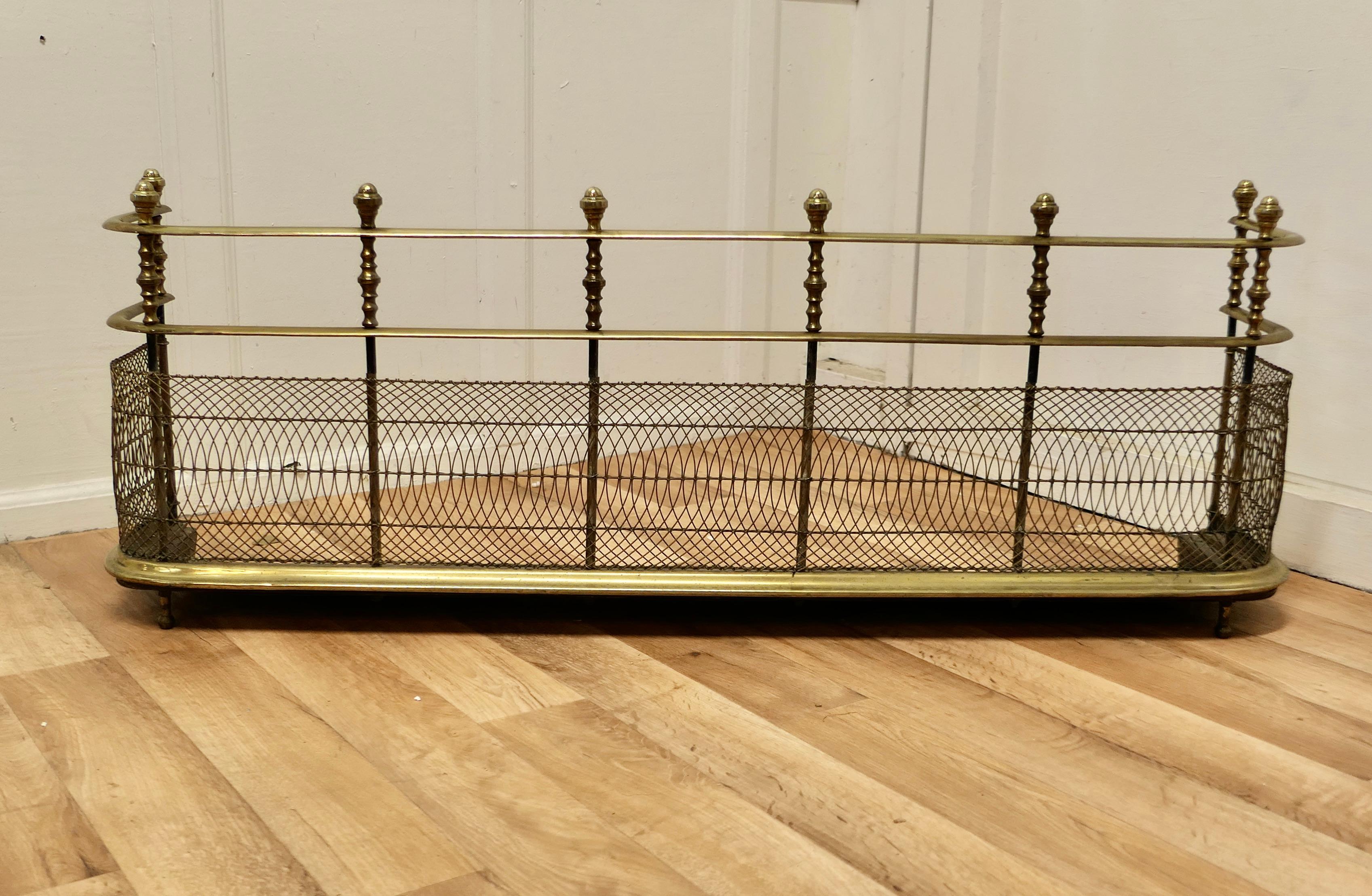 A high Georgian brass Nursery fire Guard Fender 

This is a Georgian antique Fender often known as a nursery guard as it completely surrounds the fire. 
This Fender is top quality and heavy, it is made in brass, it has a double rail separated by