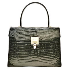 A high quality black crocodile handbag, France, 1980s.