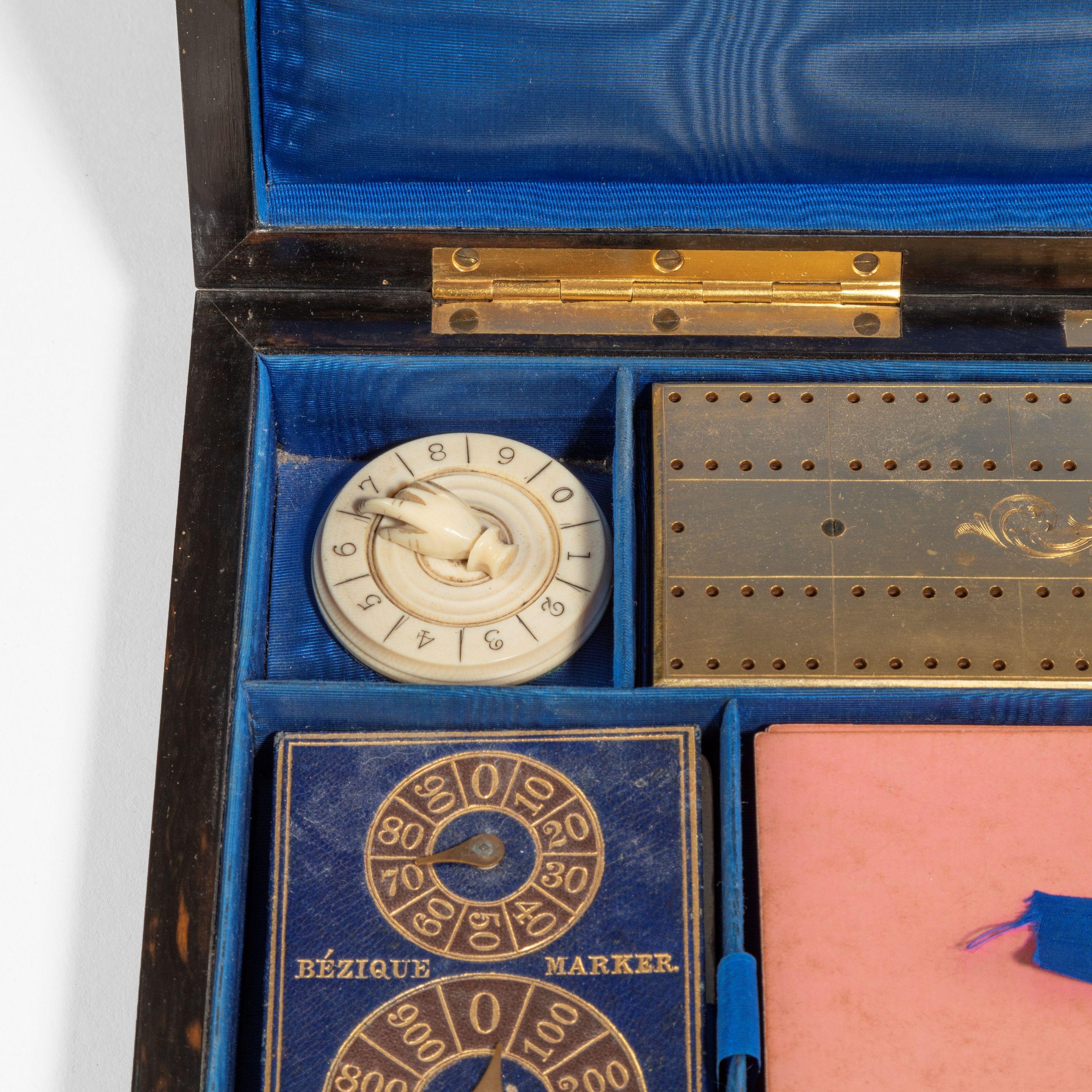 Mid-19th Century A high Victorian burr walnut games box