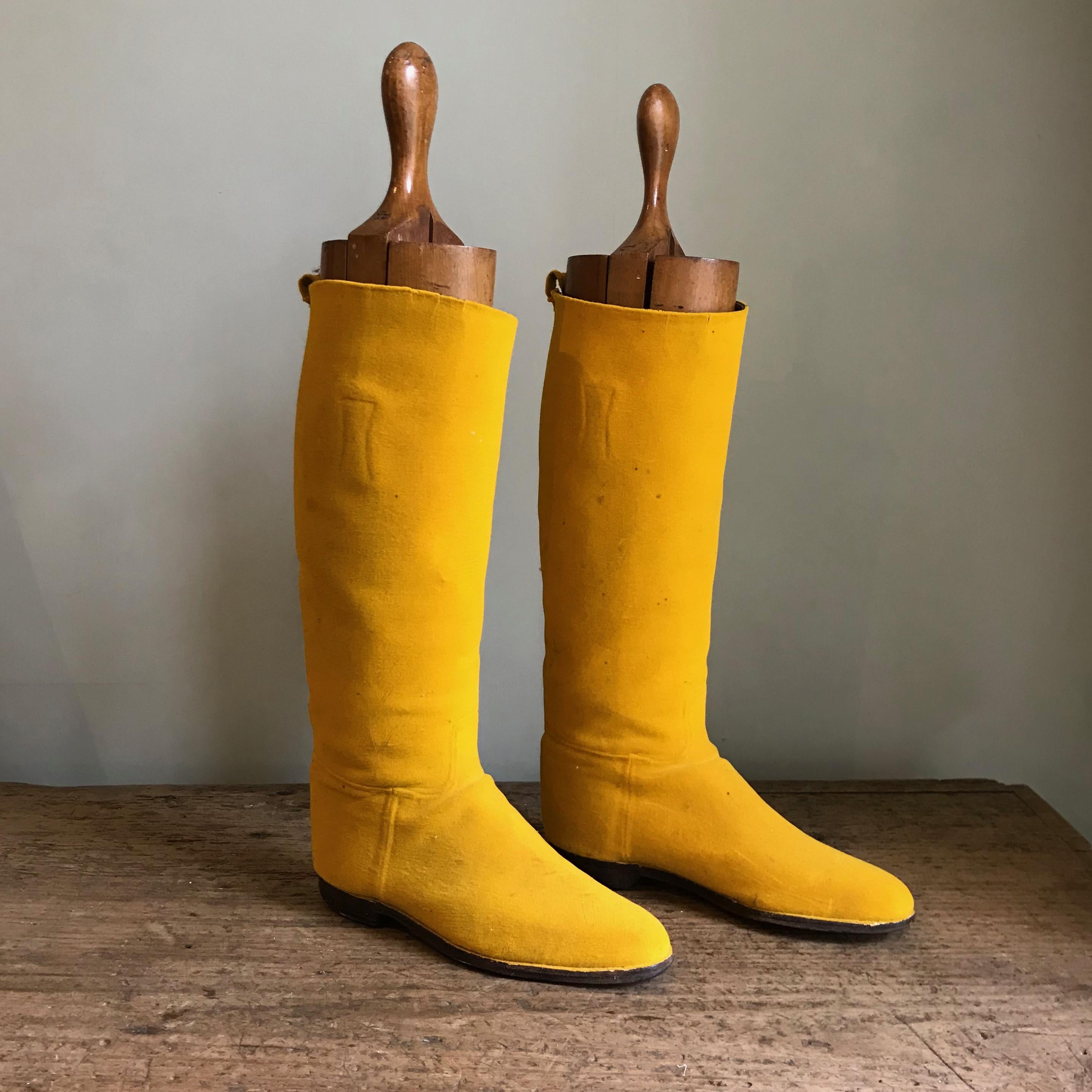 A pair of unique English Edwardian riding boots in yellow.

The boots have been flocked in this wonderful color at some stage in their life giving them this fantastic appearance.