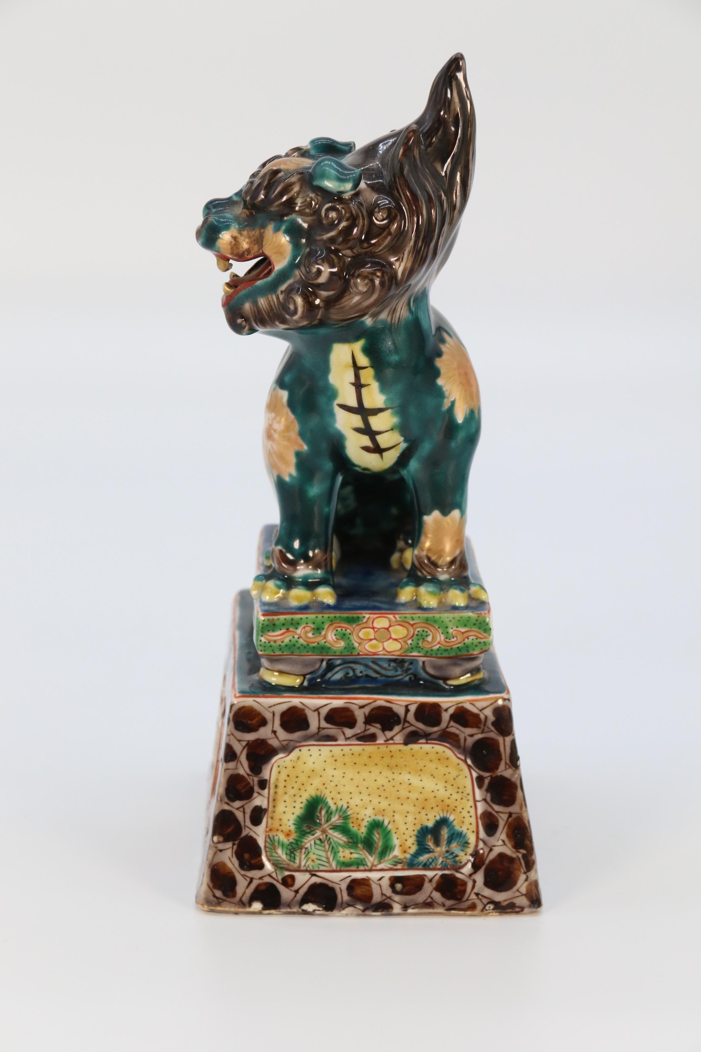 A highly decorative pair of Chinese pottery Buddhist lions circa 1900. For Sale 5