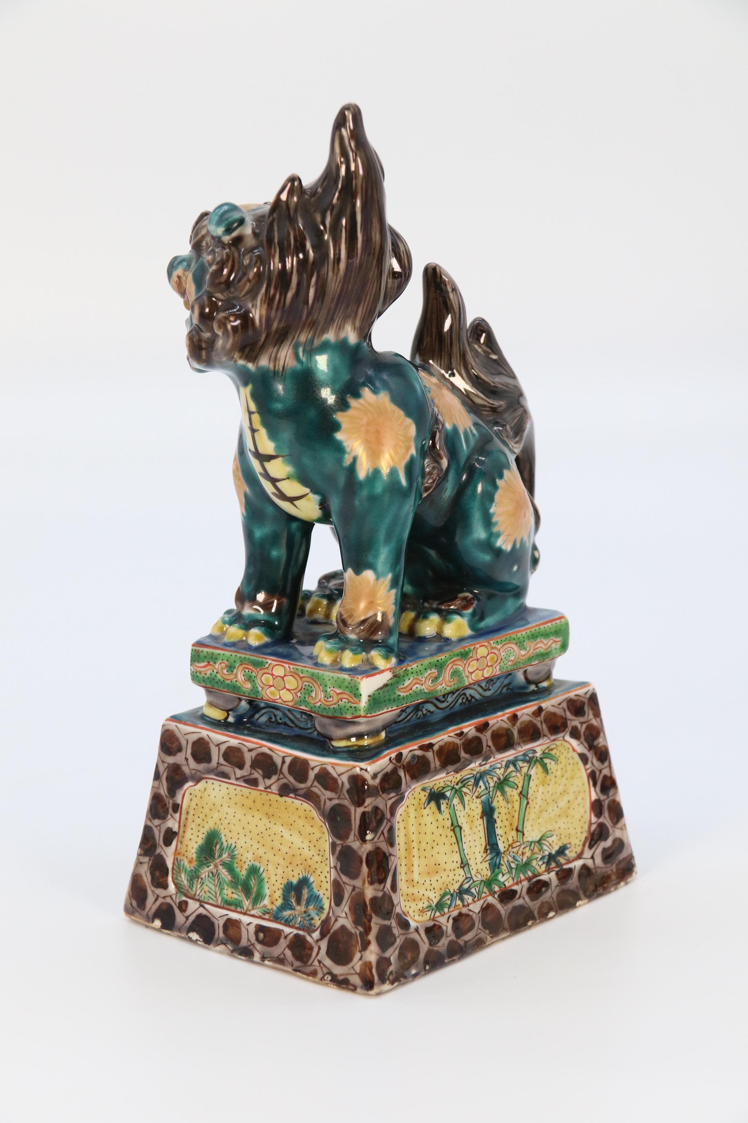A highly decorative pair of Chinese pottery Buddhist lions circa 1900. For Sale 6