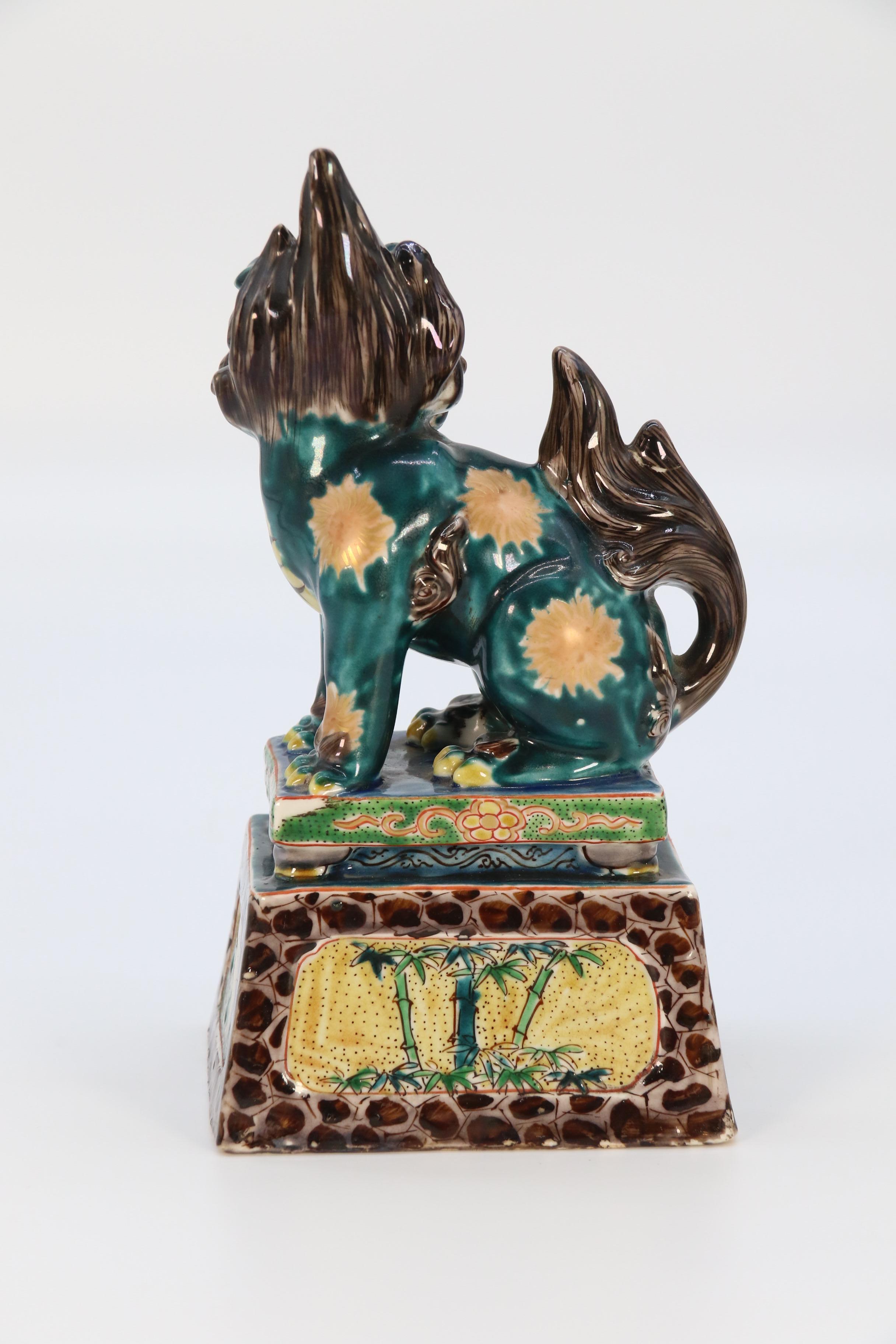 A highly decorative pair of Chinese pottery Buddhist lions circa 1900. For Sale 7