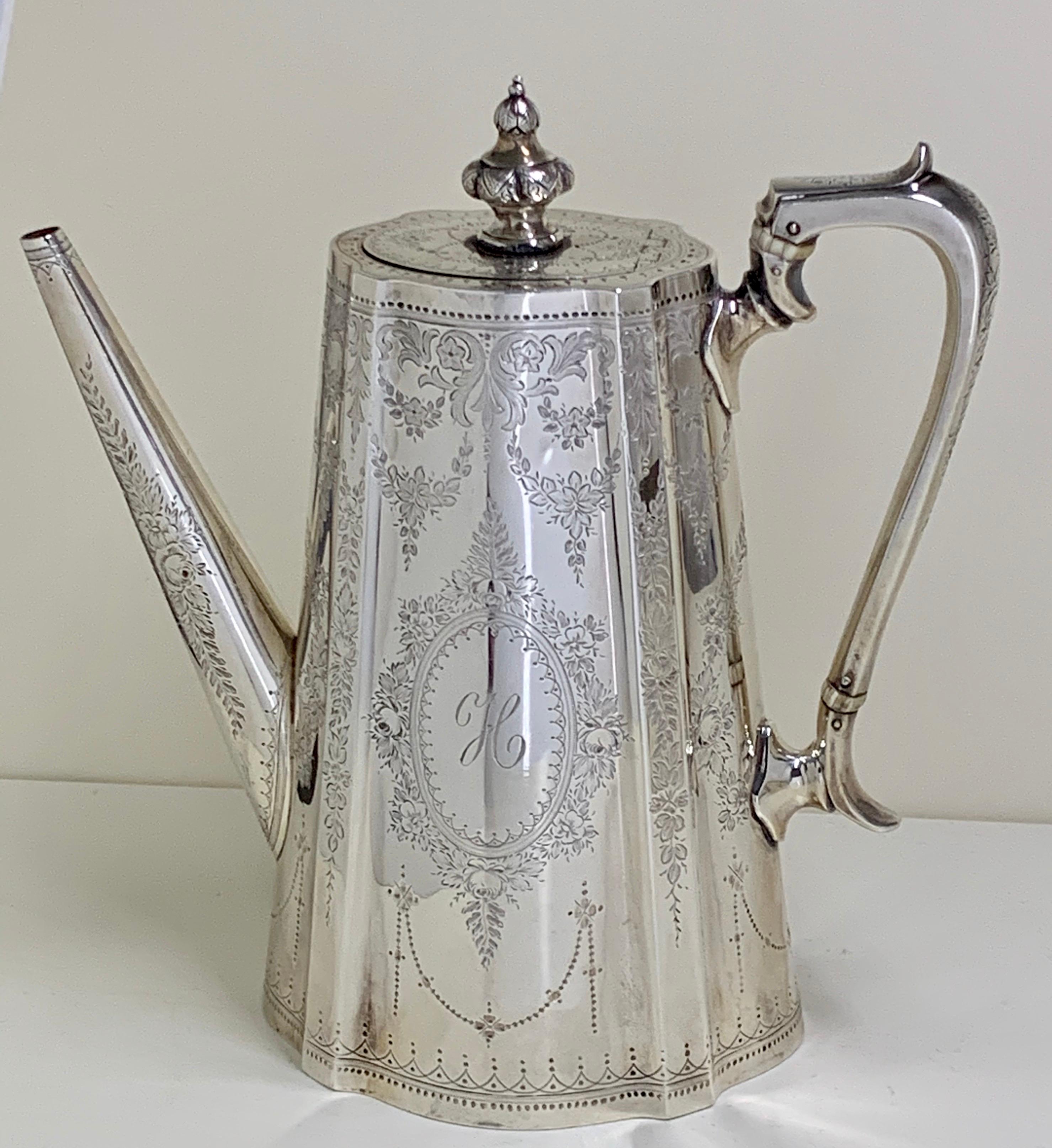 This superb high quality set was hallmarked in London in 1873 by Samuel Smily or Smiley,
This is a Victorian, sterling silver tea and coffee service featuring beautifully engraved floral and scrolled decoration on a canister shaped body with large