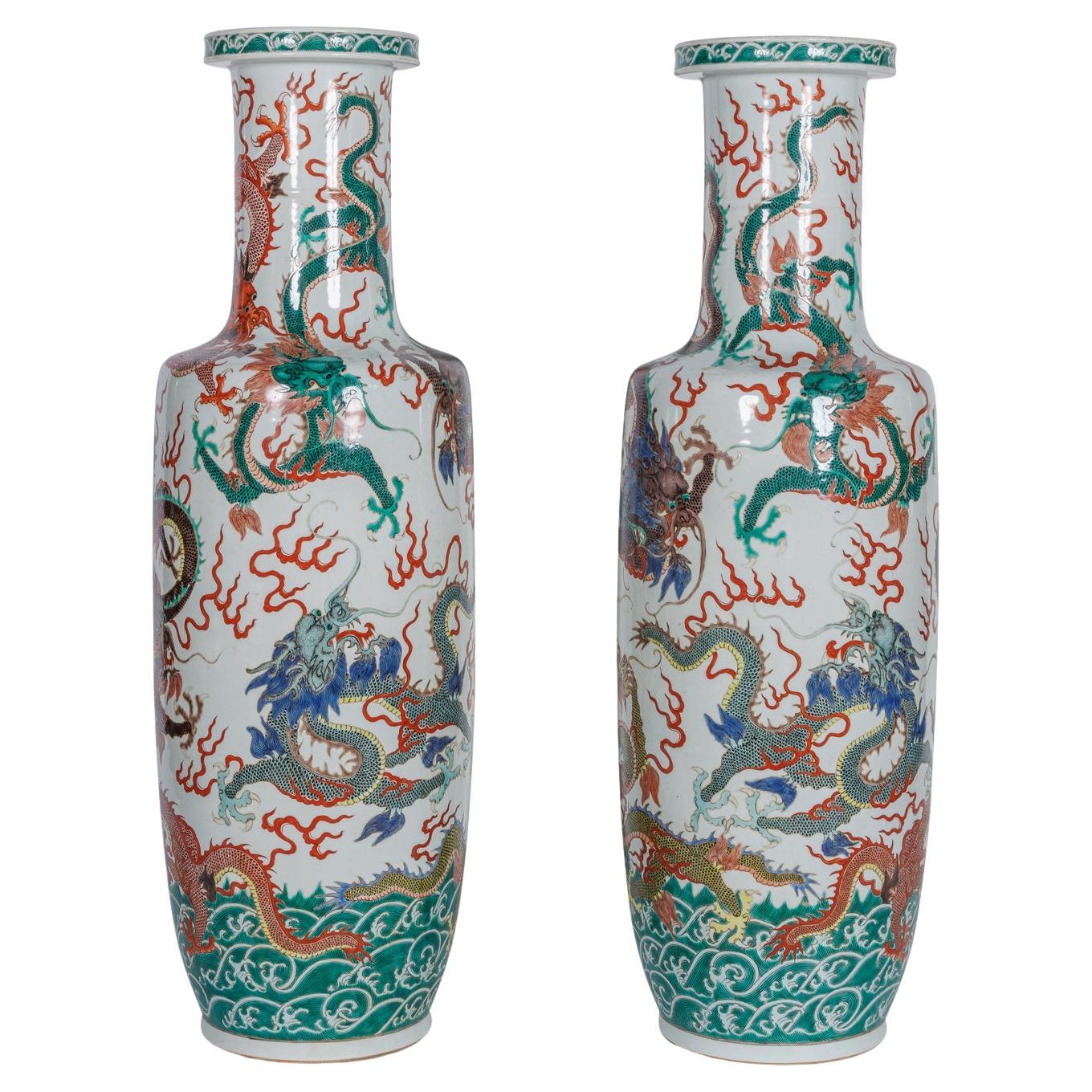 A Highly Rare Pair of Monumental Qing Dynasty Rouleau Porcelain "Dragon" Vases
