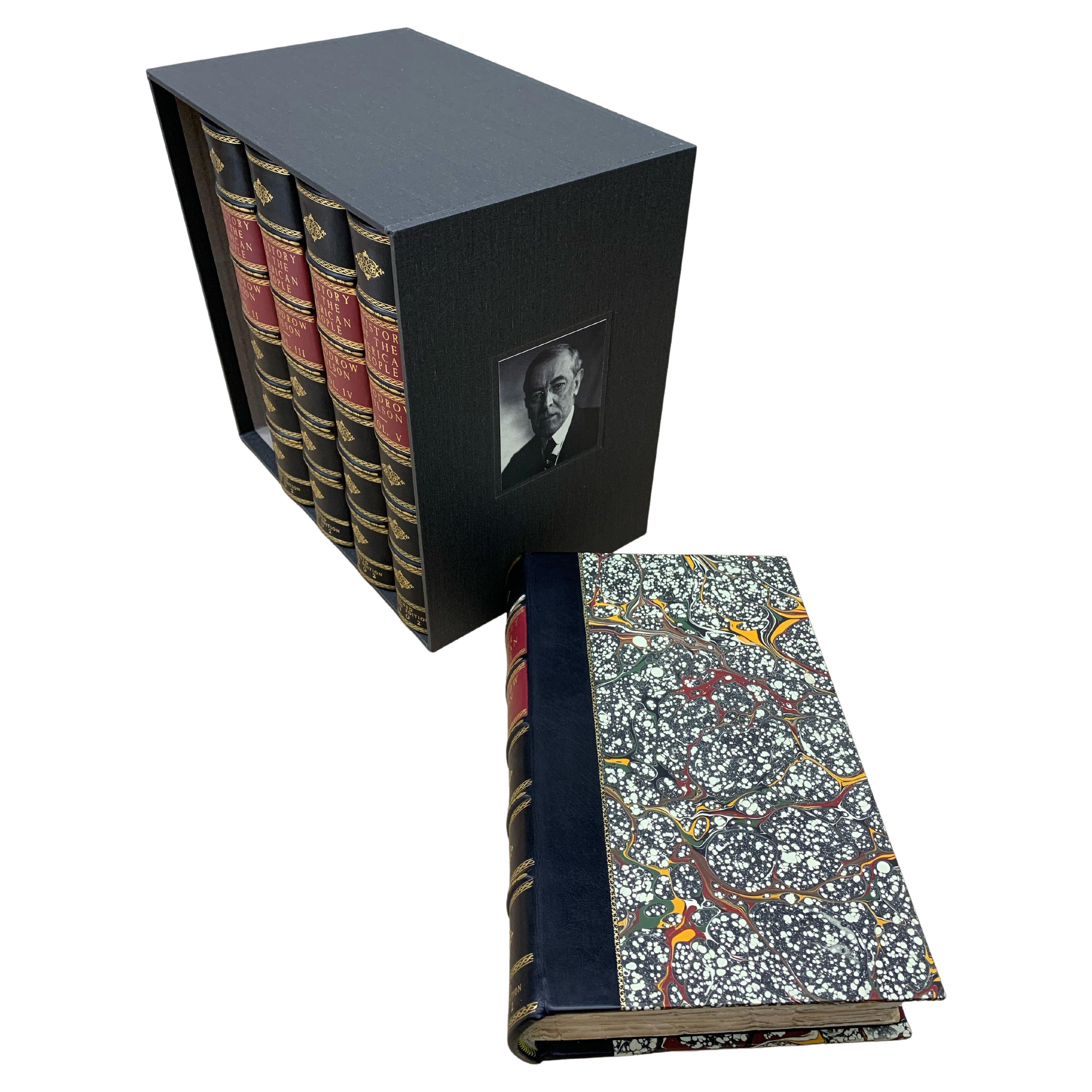 Woodrow Wilson. A History of the American People. New York: Harper & Brothers, 1902. Alumni Edition #29 of 350 copies. Volume I signed by Woodrow Wilson on limitation page. 5 Volumes. Large octavos. Rebound in ¼ leather and marbled paper sides, with