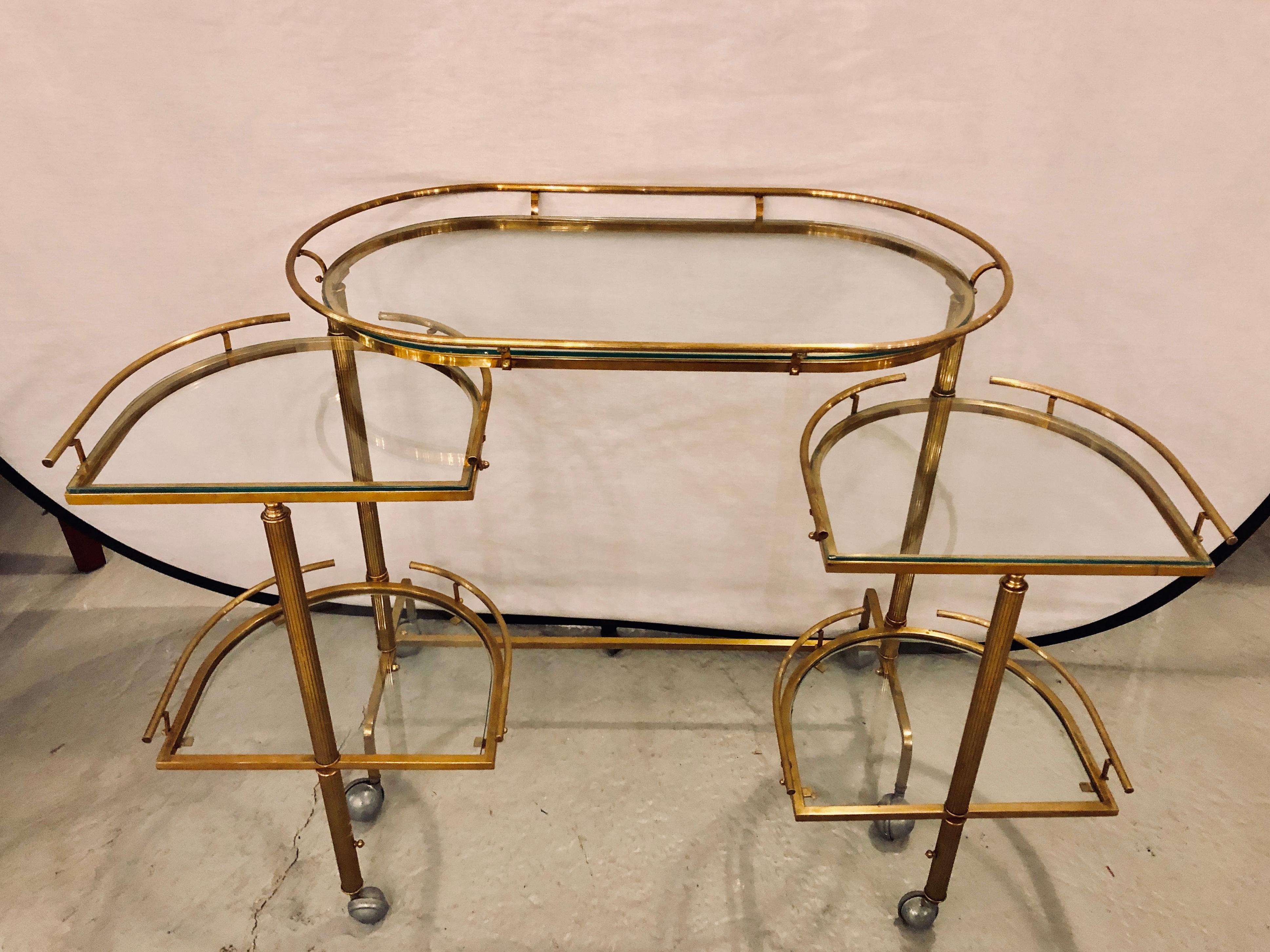 Hollywood Regency Brass and Glass Swivel Bar Cart In Good Condition In Stamford, CT
