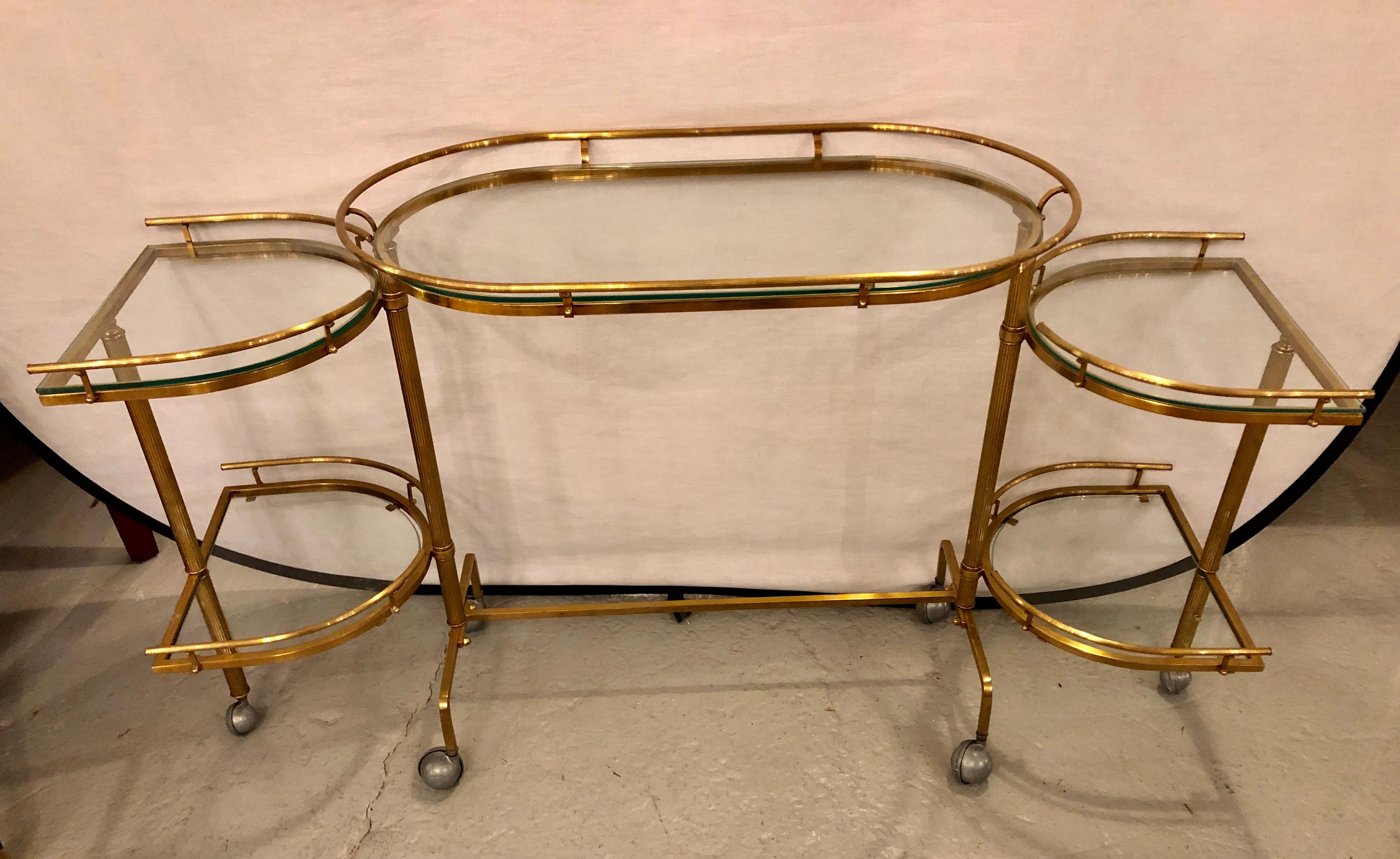 20th Century Hollywood Regency Brass and Glass Swivel Bar Cart