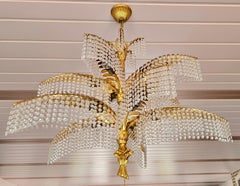 A Hollywood Regency French Palm Tree Gilt Bronze and Crystal Chandelier