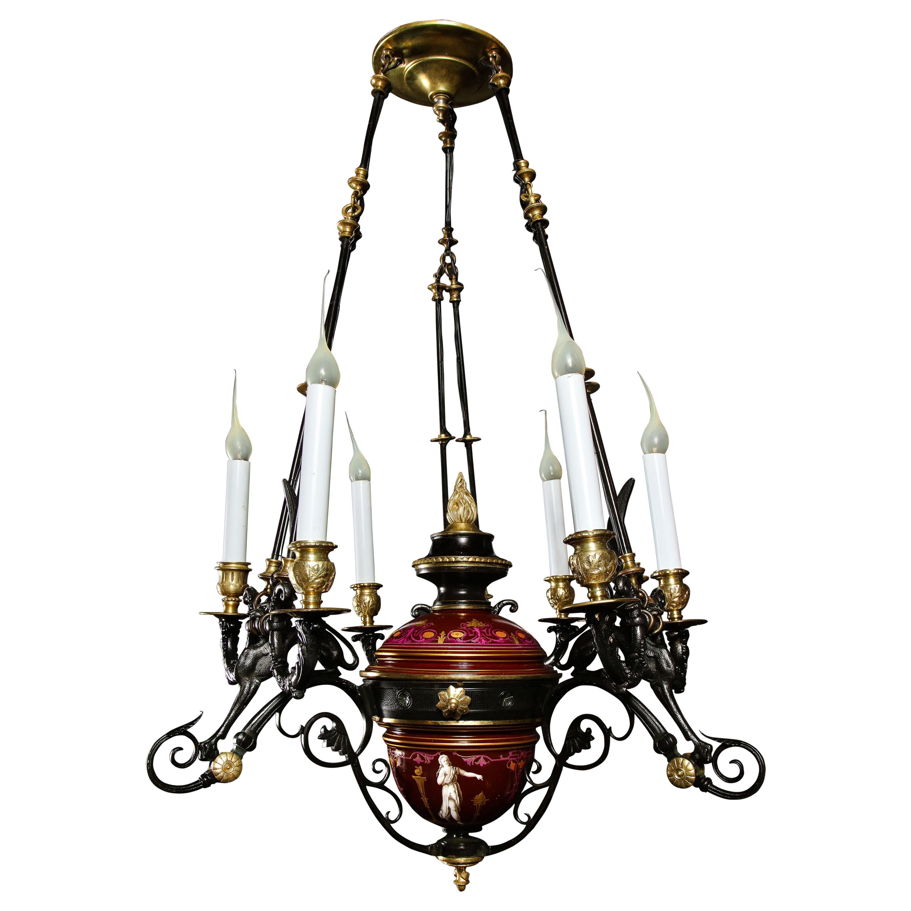 Hollywood Regency Style Gilt Bronze and Red Porcelain Figural Chandelier For Sale