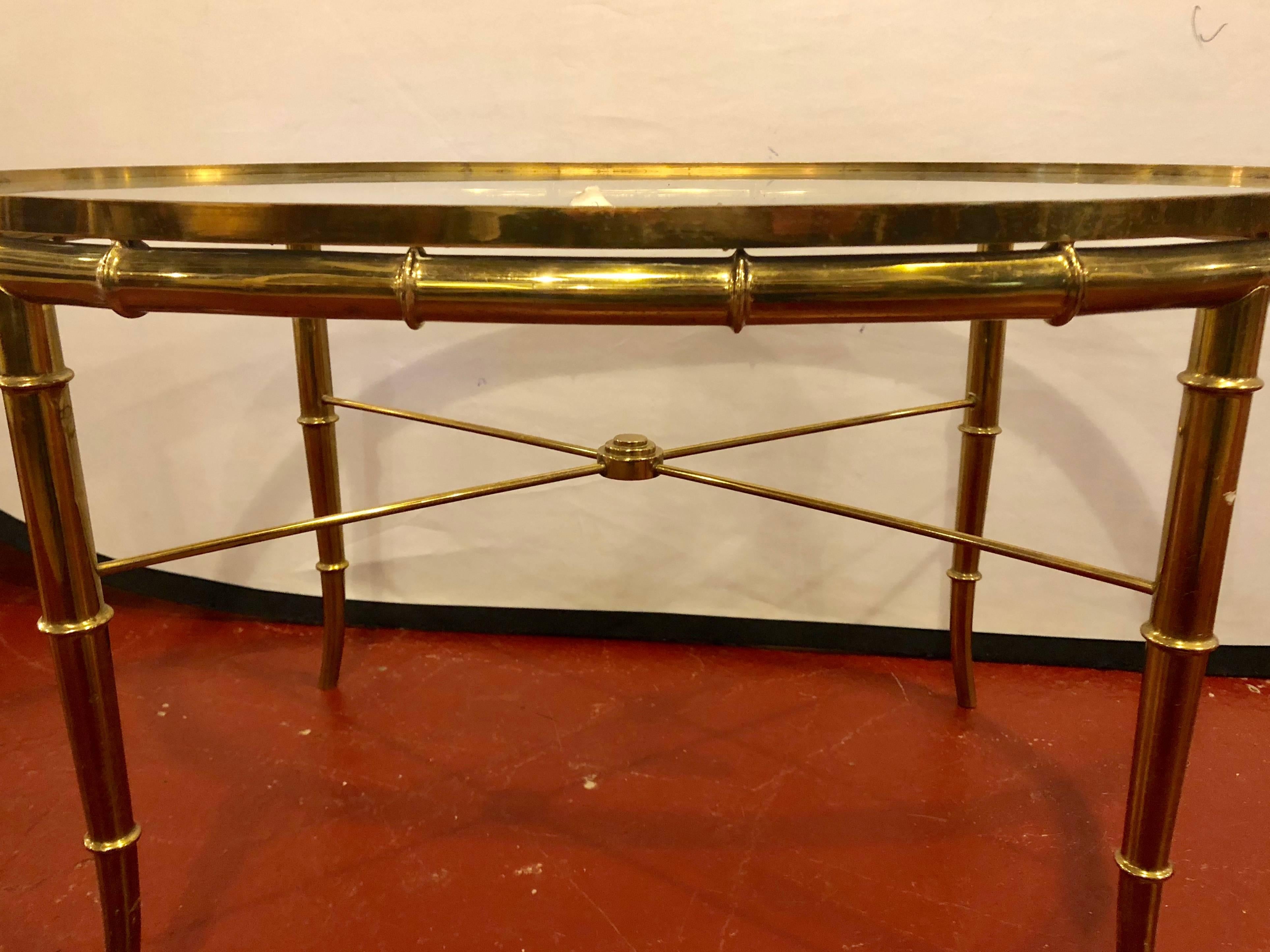 Hollywood Regency Style Gilt Metal Faux Bamboo Oval Glass Top Coffee Table In Good Condition In Stamford, CT