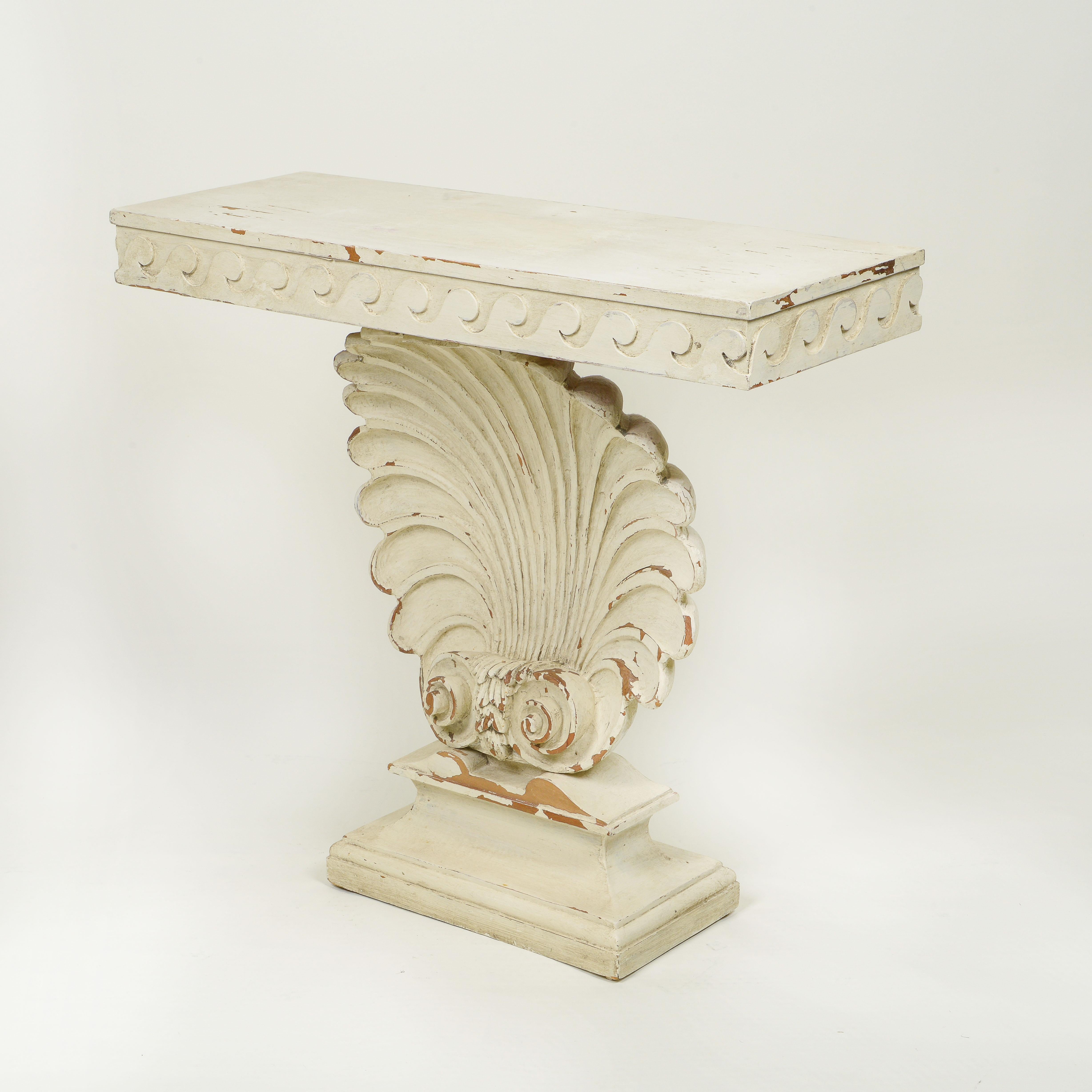 After a design by Edward Wormley for Dunbar. Rectangular top over a carved base.