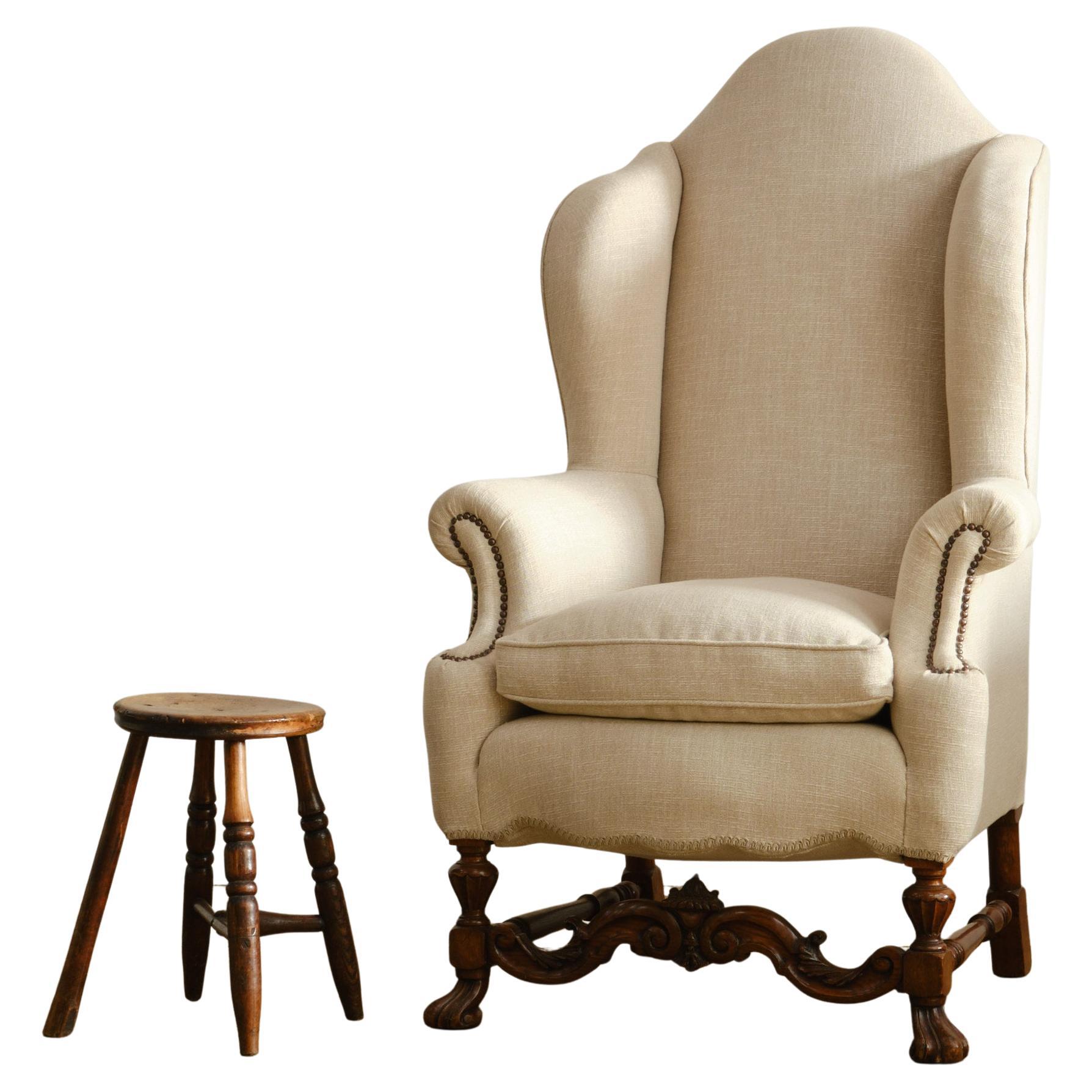 A huge 19th century William & Mary style wingback armchair For Sale