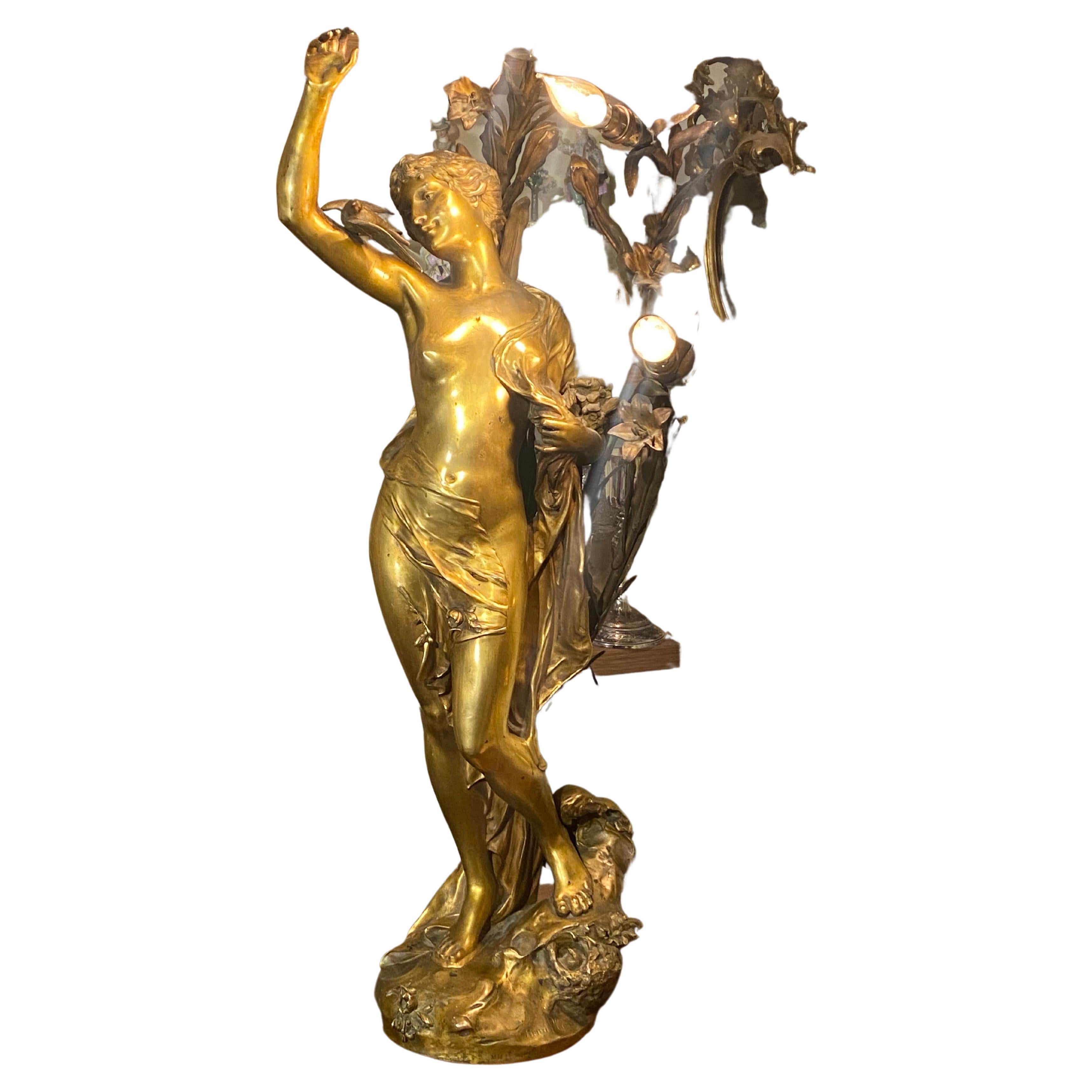 Grande lampe figurative en bronze Art Nouveau reprsentant une femme, signe Henri Honore Ple
