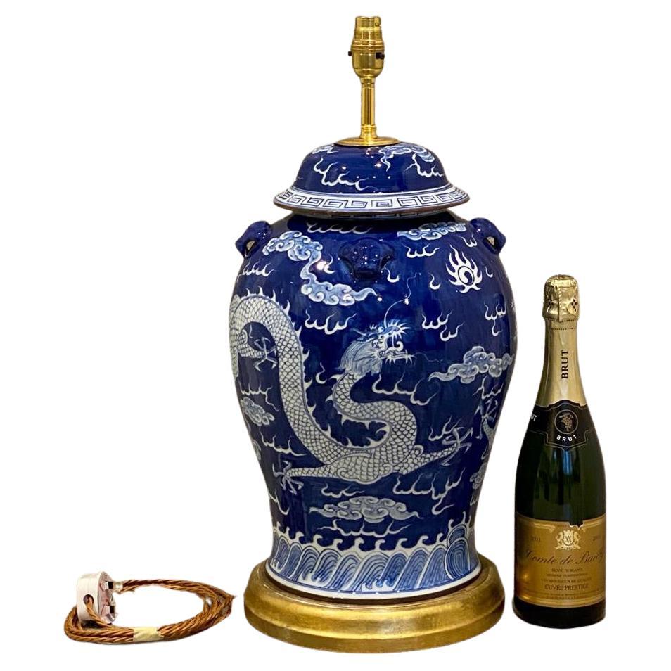 If you love the Oriental clam interior trend, this huge Chinese Blue Table Lamp is a must have for you!
This traditional oriental Chinese blue table lamp features an authentic Asian baluster vase body decorated with a finely detailed Dragon motif