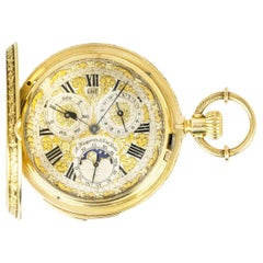 A Huguenin & Sons. Orologio da tasca con calendario in oro e ripetizione di quarto C1890