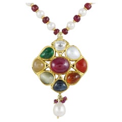 A indian and islamic heritage Mughal multi gem pendant in 18K gold  Navratna